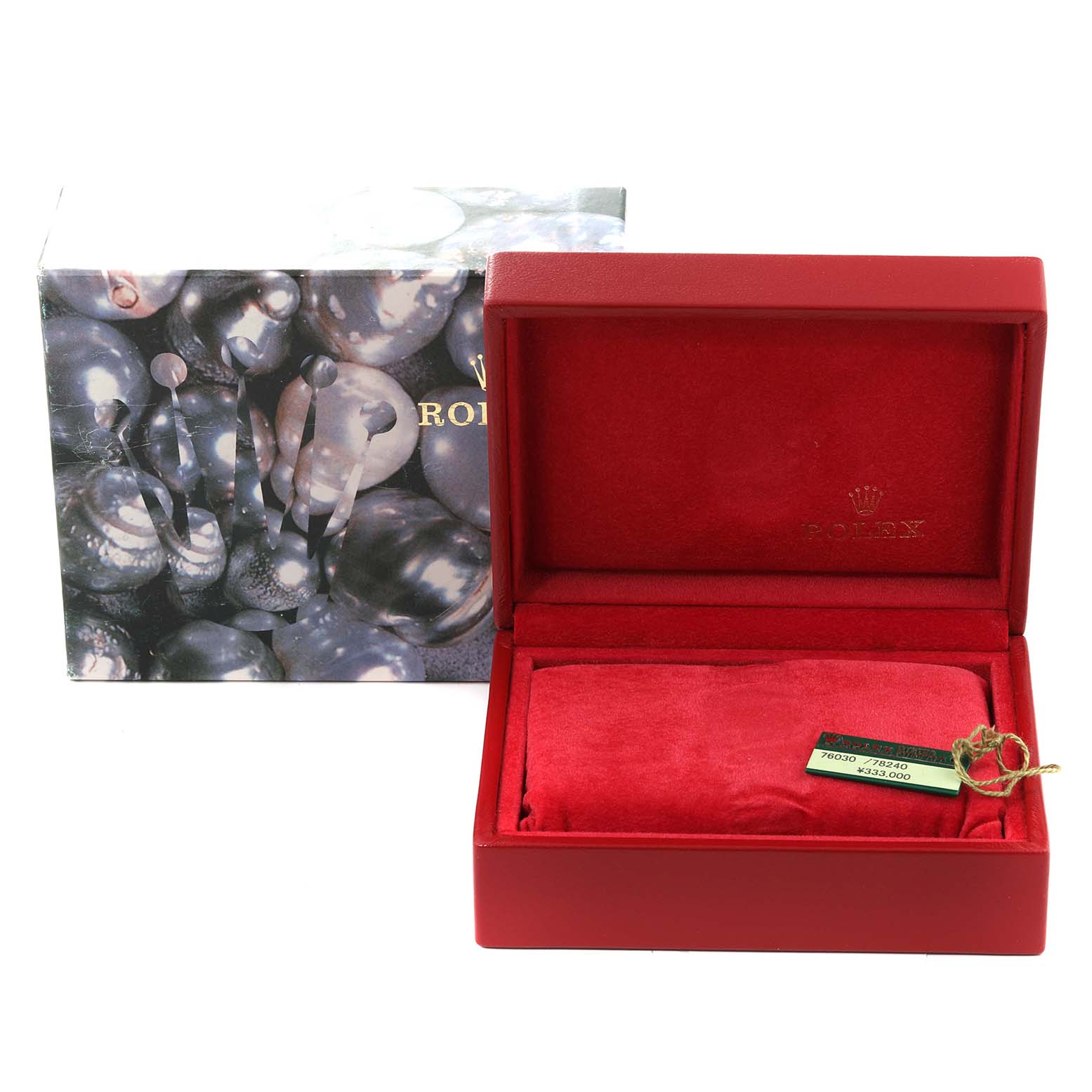 This image shows the open presentation box and outer box for a Rolex Oyster Perpetual 76030 Women's Stainless Steel Black Dial 76030 Women's Stainless Steel Black Dial model watch.