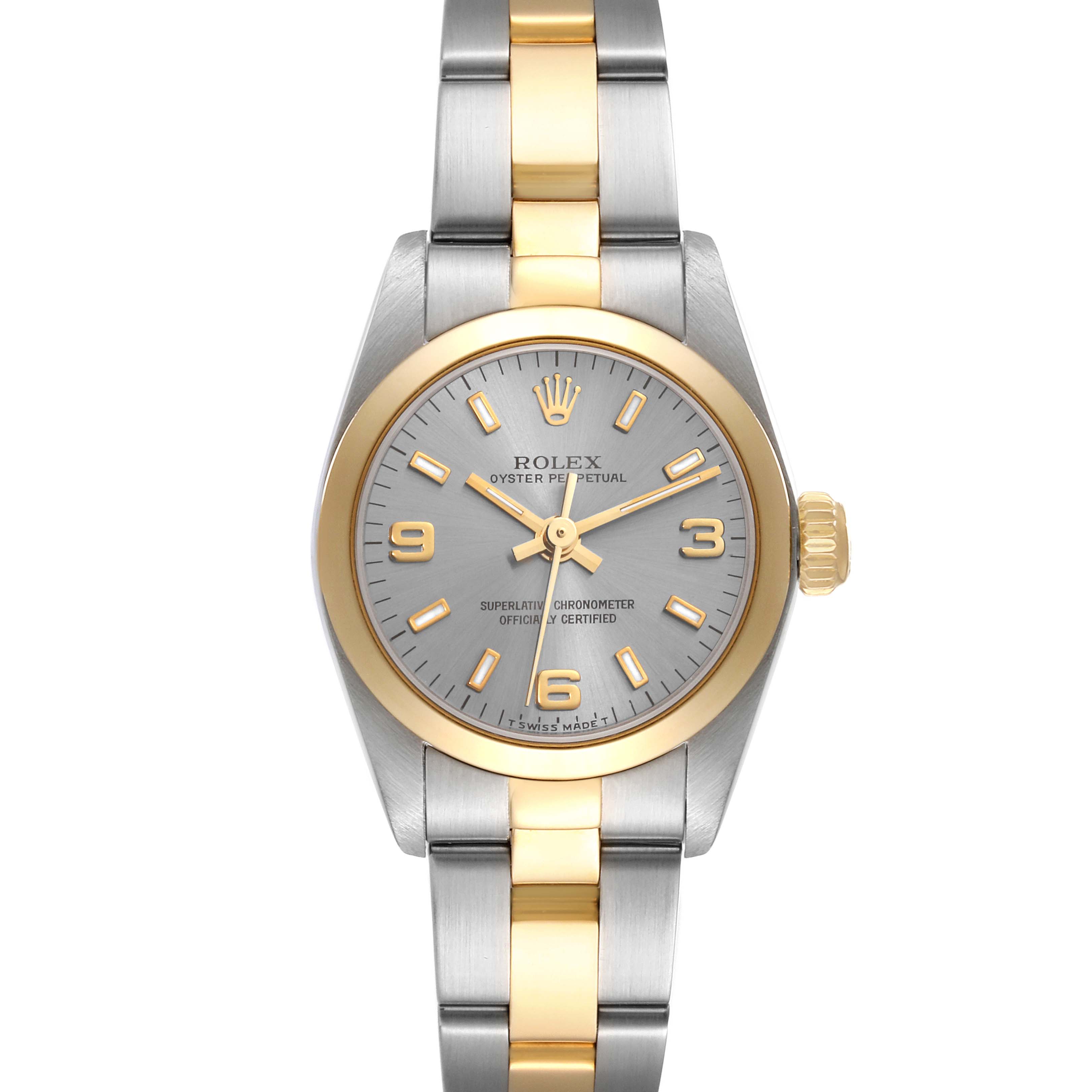 This image shows a front view of the Rolex Oyster Perpetual 67183 Women's Steel and Gold (two tone) Grey Dial 67183 Women's Steel and Gold (two tone) Grey Dial watch featuring a two-tone bracelet and a silver dial with gold accents.