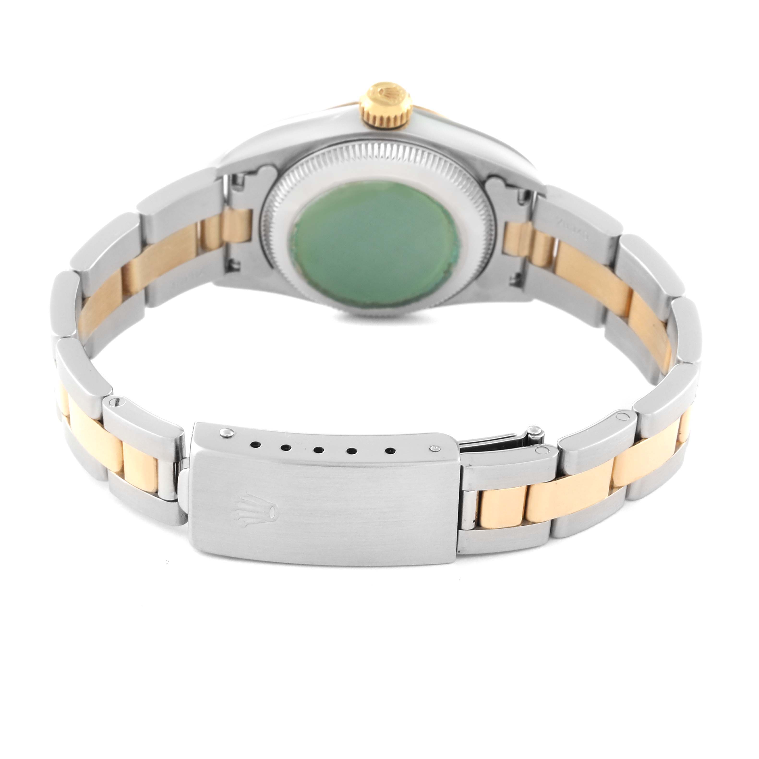 This Rolex Oyster Perpetual 67183 Women's Steel and Gold (two tone) Grey Dial 67183 Women's Steel and Gold (two tone) Grey Dial watch is shown from the back, highlighting the case back, bracelet, and clasp.