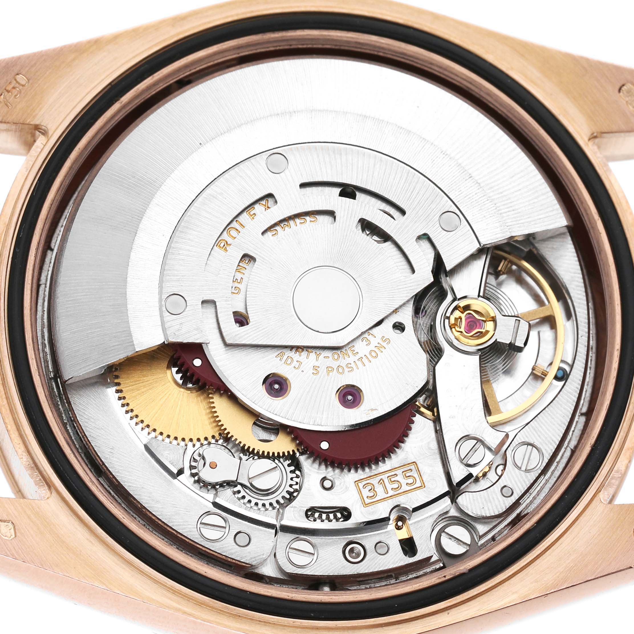 The image shows the internal movement of a Rolex President 118235 Men's Rose Gold Pink Dial model watch, focusing on gears and the oscillating weight.
