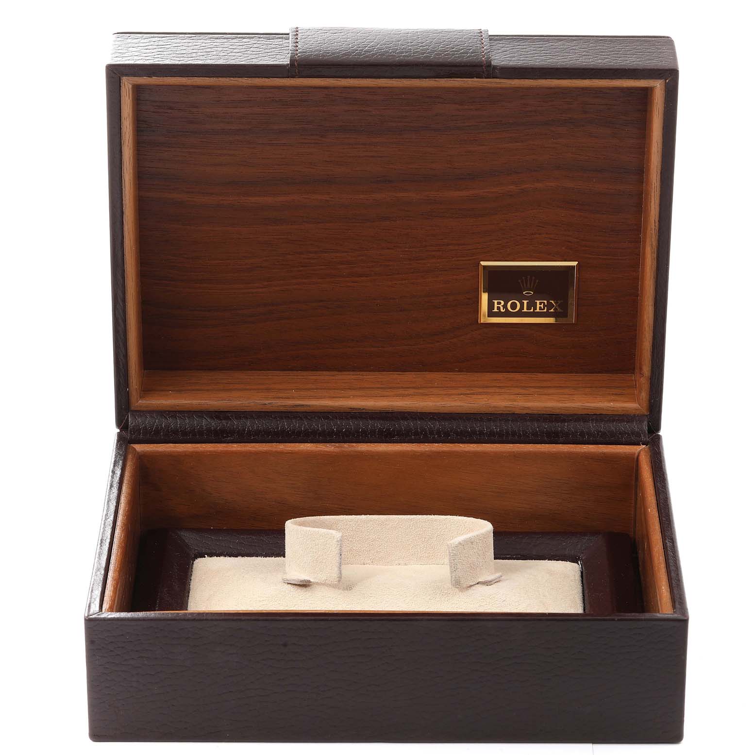 This image shows an open Rolex President 18238 Men
s Yellow Gold Black Dial 18238 Men
s Yellow Gold Black Dial model watch box with the brand name on the inside lid.