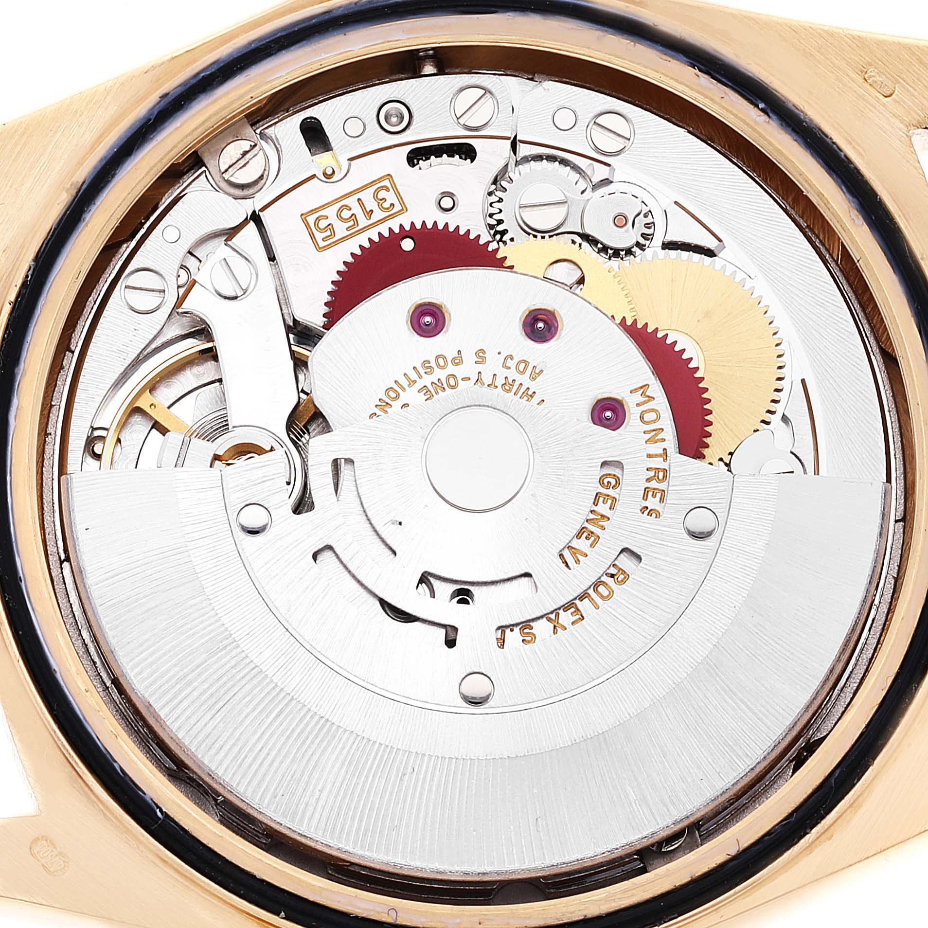 The image shows the internal mechanical movement of a Rolex President 18238 Men
s Yellow Gold Black Dial 18238 Men
s Yellow Gold Black Dial watch viewed from the back.