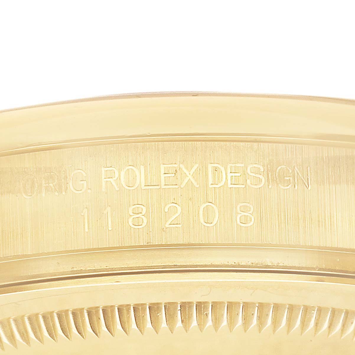 The image shows the engraved side of the Rolex President 118208 Men's Yellow Gold Champagne Dial model with design number 118208.