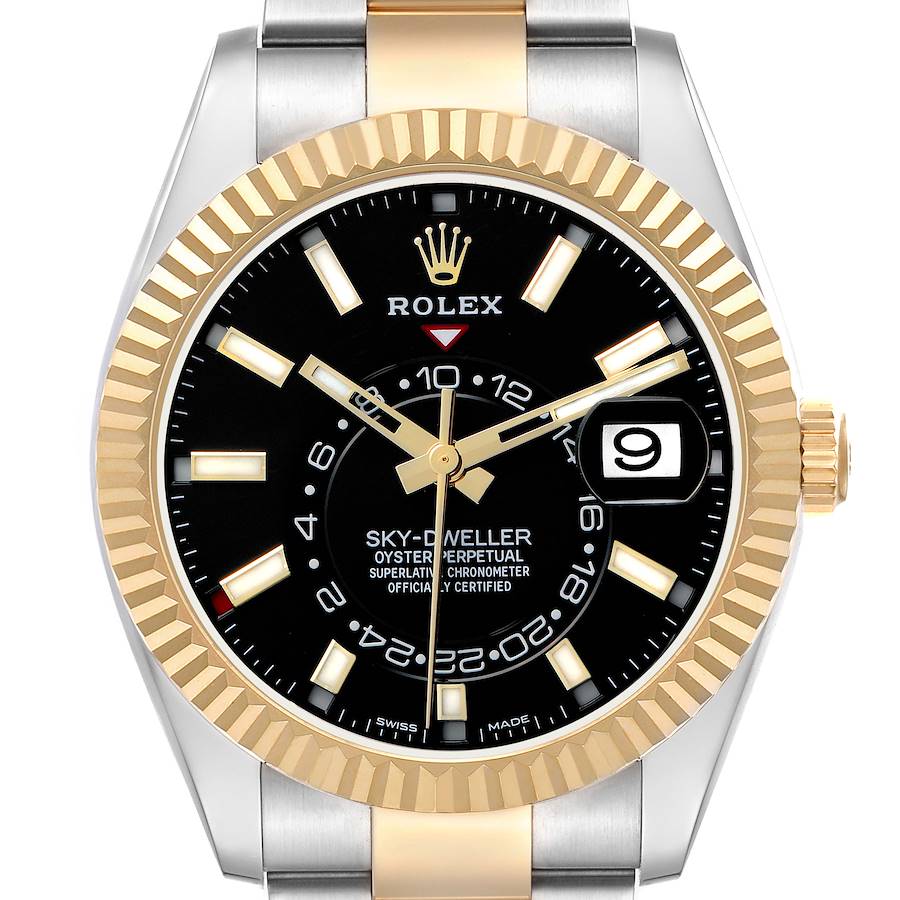 The Rolex Sky-Dweller 326933 Men's Steel and Gold (two tone) Black Dial is shown from a front angle, highlighting the black dial, gold bezel, and date display.
