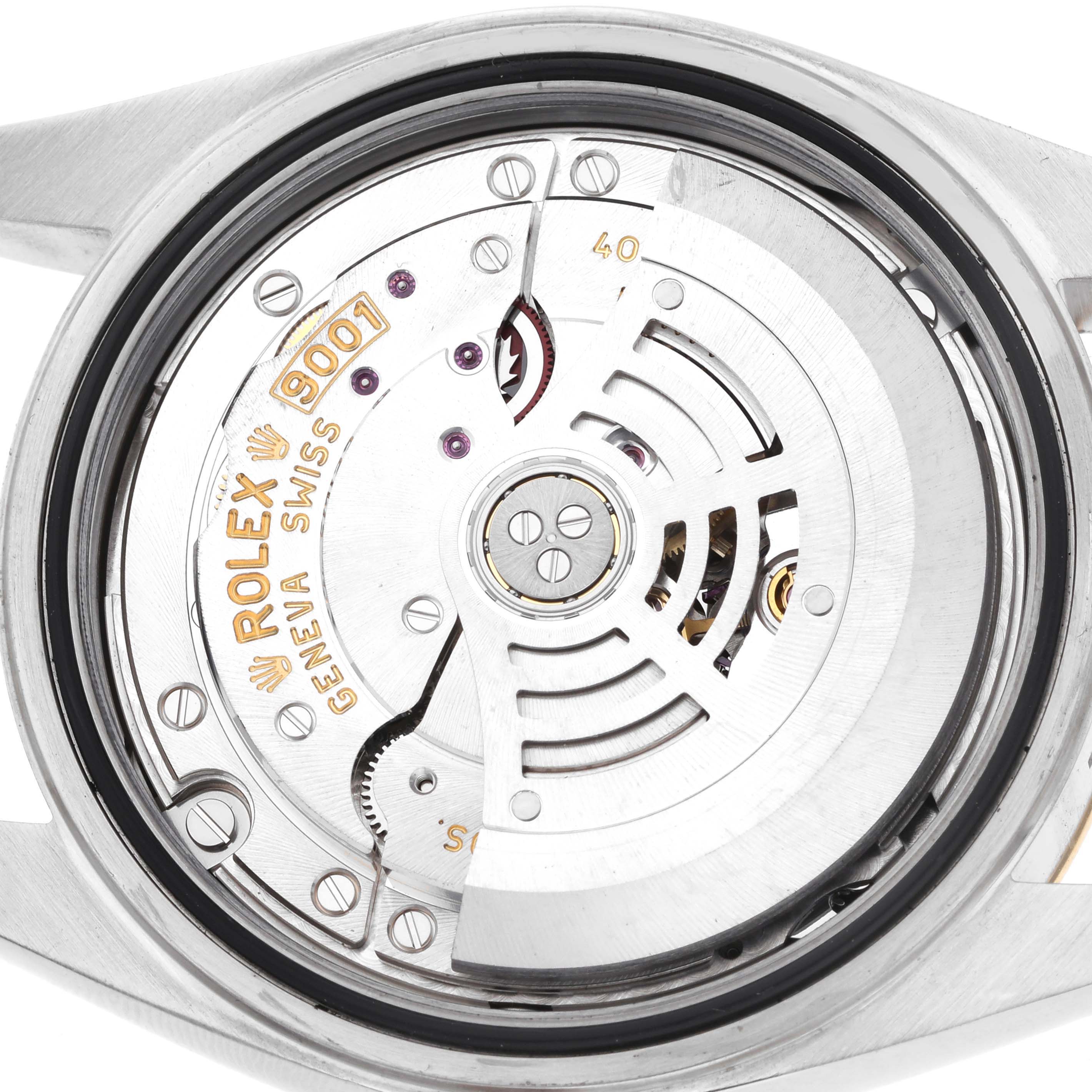 The image shows the intricate movement mechanism of a Rolex Sky-Dweller 326933 Men
s Steel and Gold (two tone) Black Dial watch from the back.