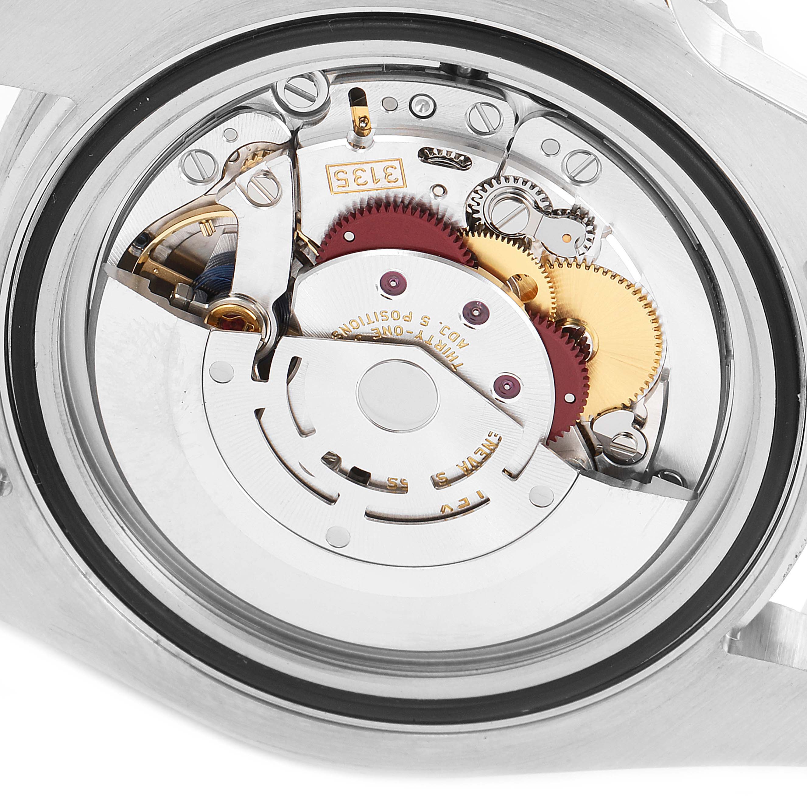 This image shows the rear, internal view of the Rolex Submariner 116610LN Men's Stainless Steel Black Dial 116610LN Men's Stainless Steel Black Dial watch, revealing its intricate movement mechanisms.