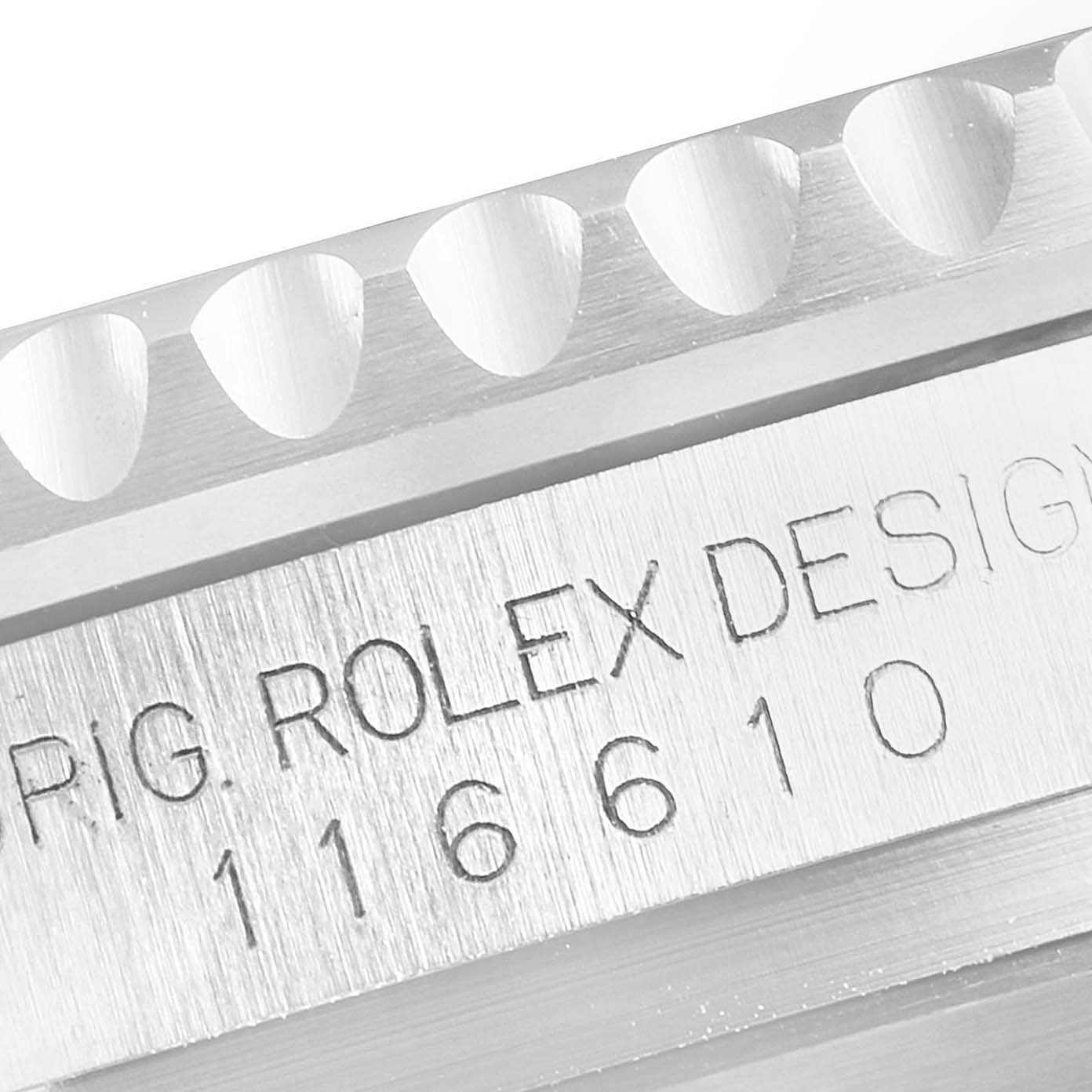 The image shows a close-up of the case side engraving and part of the bezel of the Rolex Submariner 116610LN Men's Stainless Steel Black Dial 116610LN Men's Stainless Steel Black Dial model.
