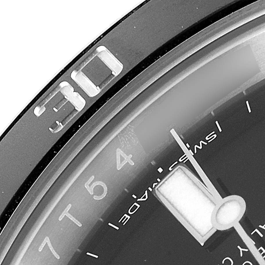 This close-up angle shows part of the bezel and dial of the Rolex Submariner 116610LN Men's Stainless Steel Black Dial 116610LN Men's Stainless Steel Black Dial watch, focusing on the 30-minute marker.