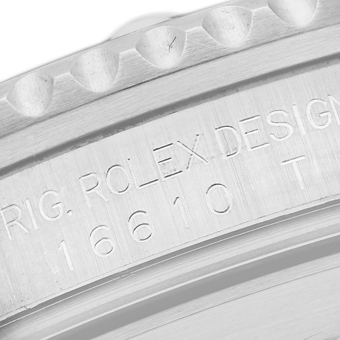 The close-up image shows the engraved side of the Rolex Submariner 16610 Men's Stainless Steel Black Dial 16610 Men's Stainless Steel Black Dial model, highlighting part of the bezel and case back.