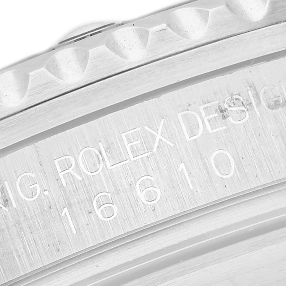 The image shows a close-up view of the bezel and engraved model number "16610" on the case of the Rolex Submariner 16610 Men
s Stainless Steel Black Dial 16610 Men
s Stainless Steel Black Dial watch.