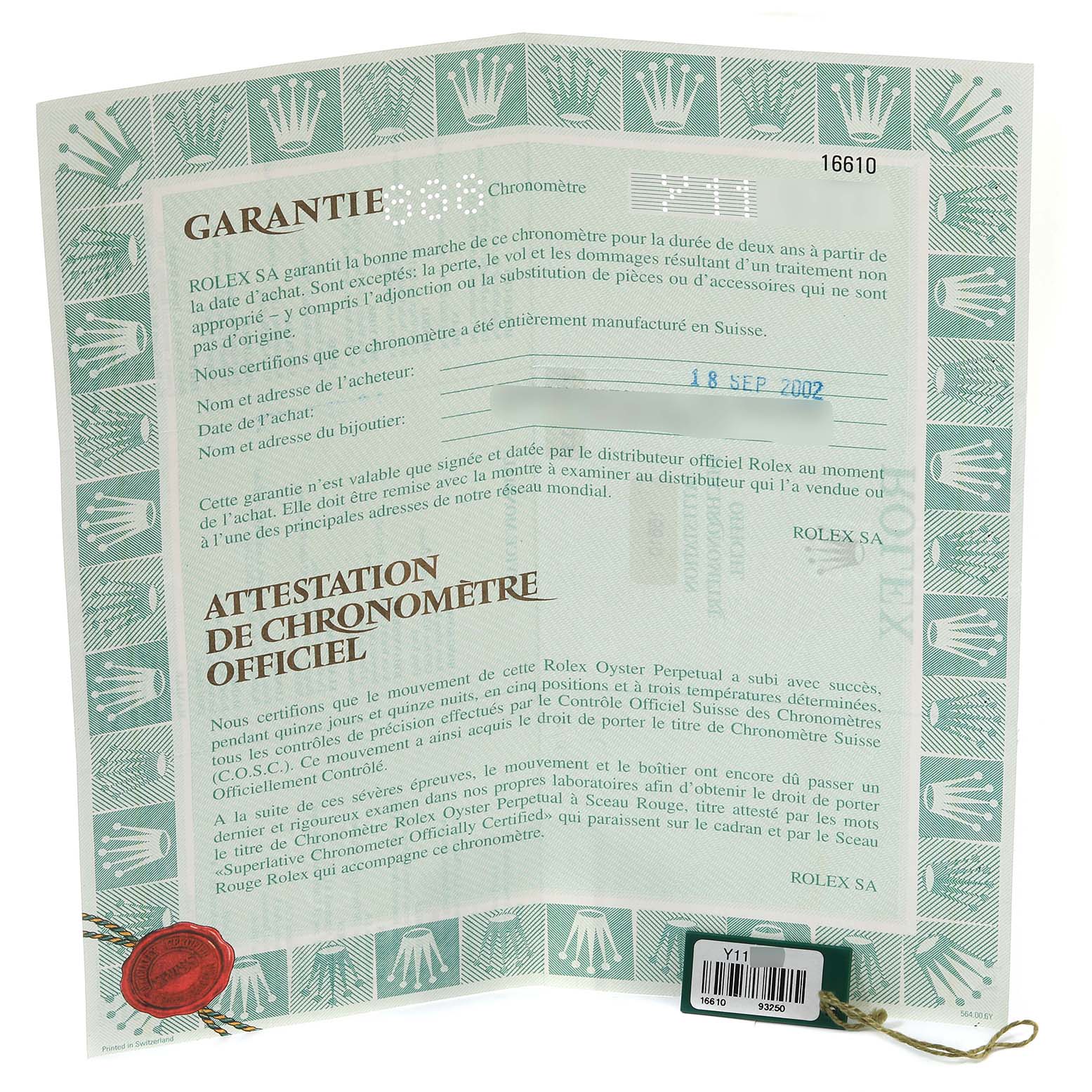 The image shows the official warranty and certificate papers for a Rolex Submariner 16610 Men
s Stainless Steel Black Dial 16610 Men
s Stainless Steel Black Dial watch, including model number 16610.