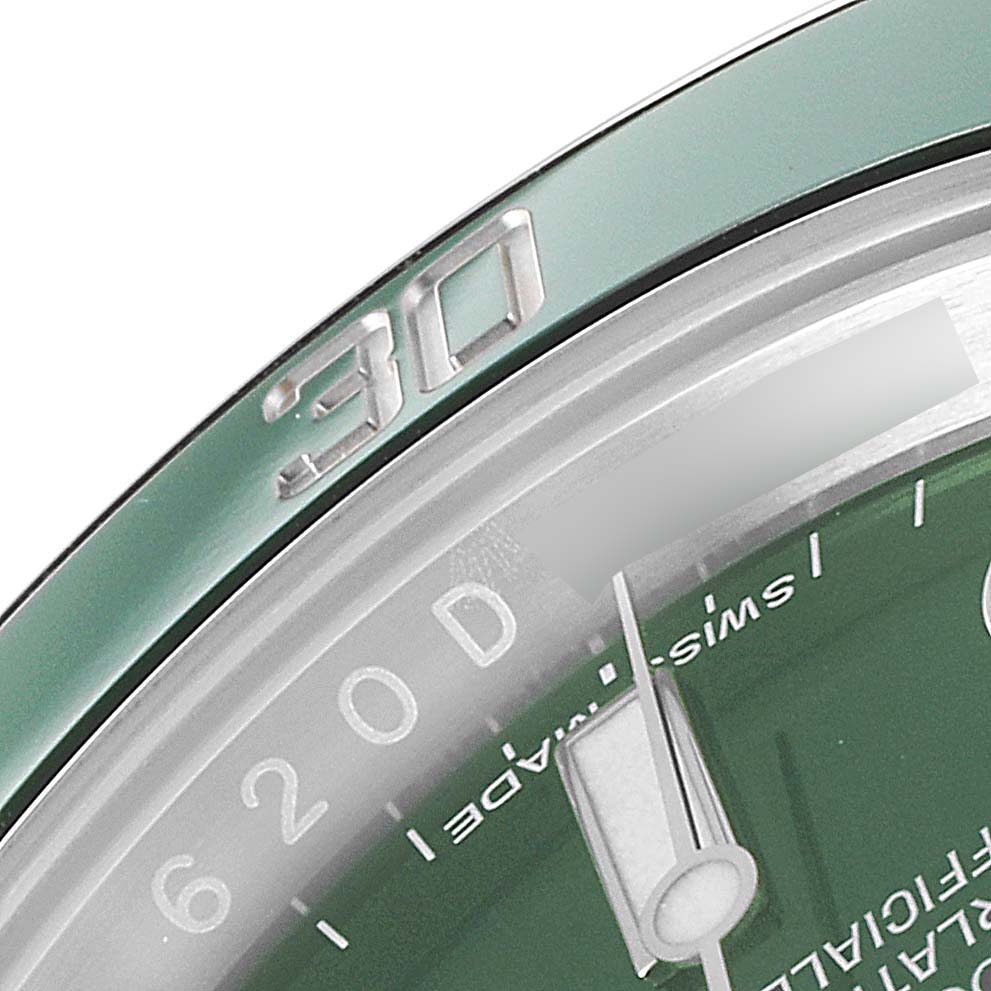 This close-up angle of the Rolex Submariner 116610LV Men
s Stainless Steel Green Dial 116610LV Men
s Stainless Steel Green Dial watch shows part of the bezel with the "30" numeral and a section of the green dial.
