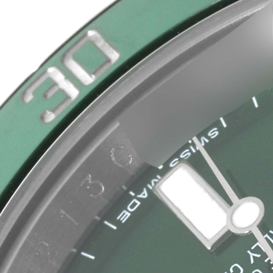 The image shows a close-up of the dial and bezel of a Rolex Submariner 116610LV Men's Stainless Steel Green Dial 116610LV Men's Stainless Steel Green Dial watch, highlighting the "30" minute marker.