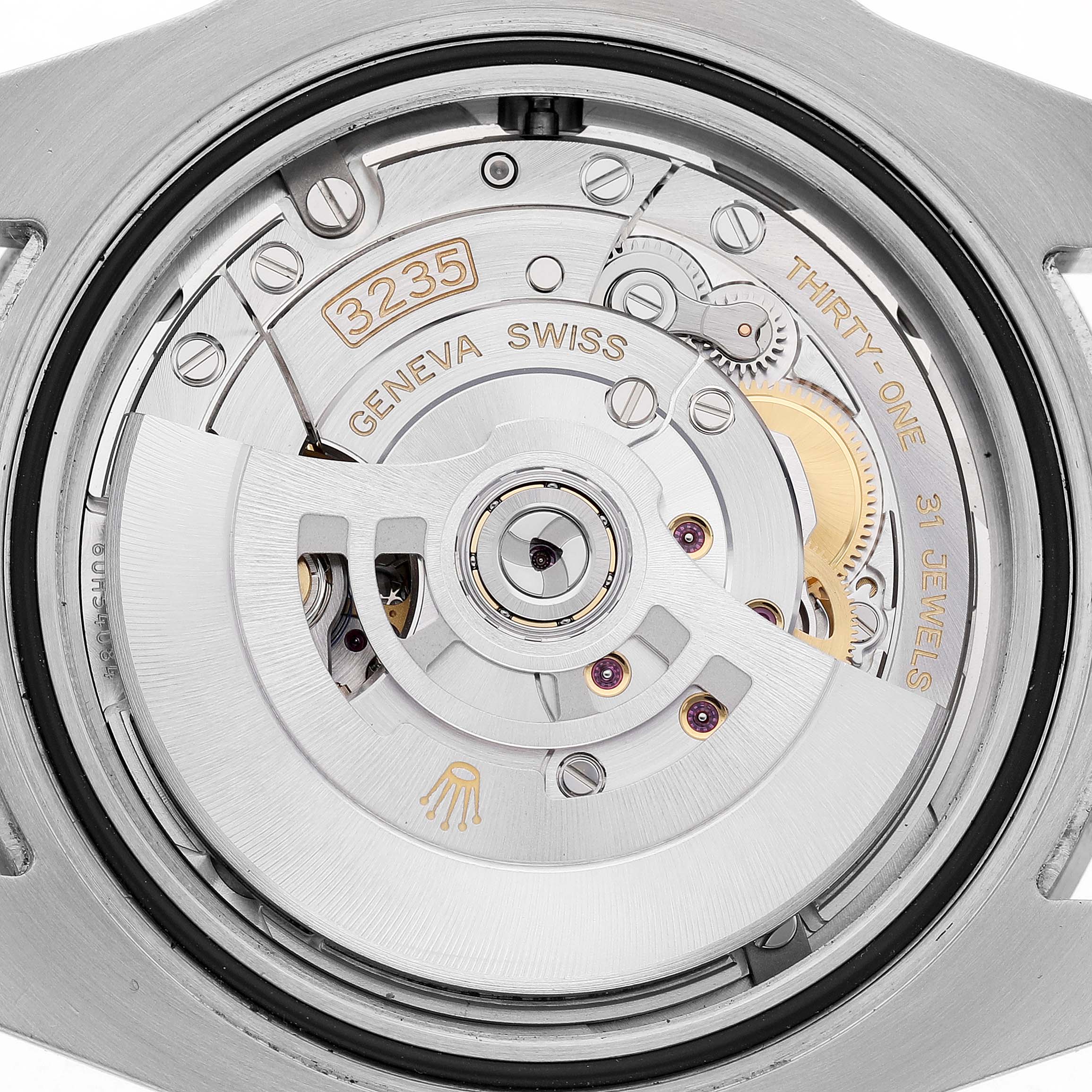 The image shows the back view of the Rolex Submariner 126610LV Men's Stainless Steel Black Dial's movement, displaying its intricate mechanical parts.