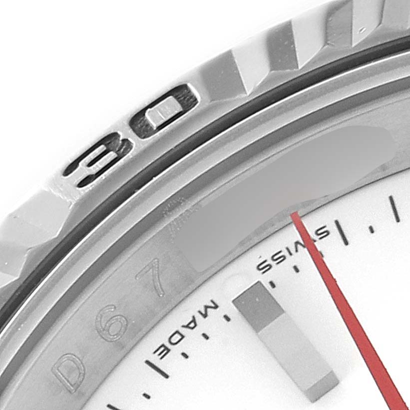 The image shows a close-up of the bezel and part of the dial of a Rolex Turn-o-Graph 116264 Men's Stainless Steel White Dial 116264 Men's Stainless Steel White Dial watch, including the "30" on the bezel and the Swiss Made marking.