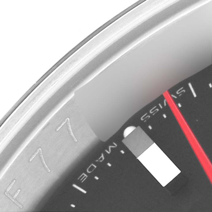 This close-up image shows a partial view of the dial and bezel of a Rolex Turn-o-Graph 116264 Men's Stainless Steel Black Dial 116264 Men's Stainless Steel Black Dial watch.