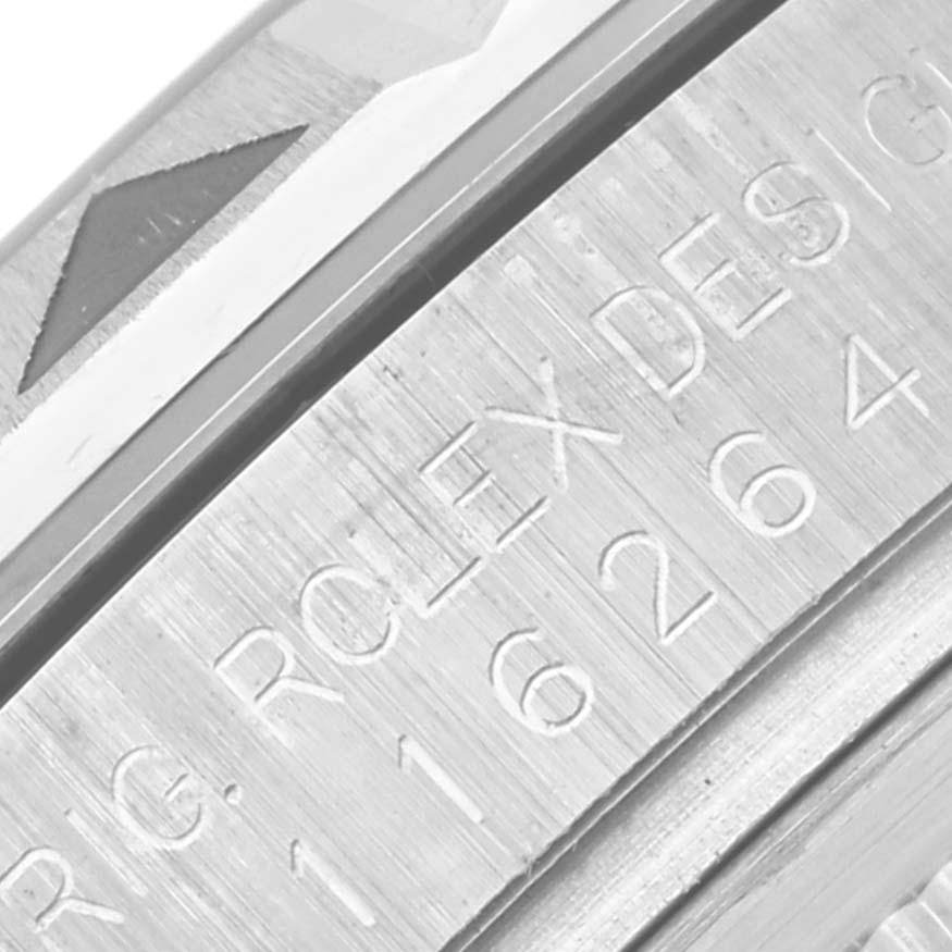 This image shows a close-up of the engraved inner bezel section of a Rolex Turn-o-Graph 116264 Men's Stainless Steel Black Dial 116264 Men's Stainless Steel Black Dial watch.