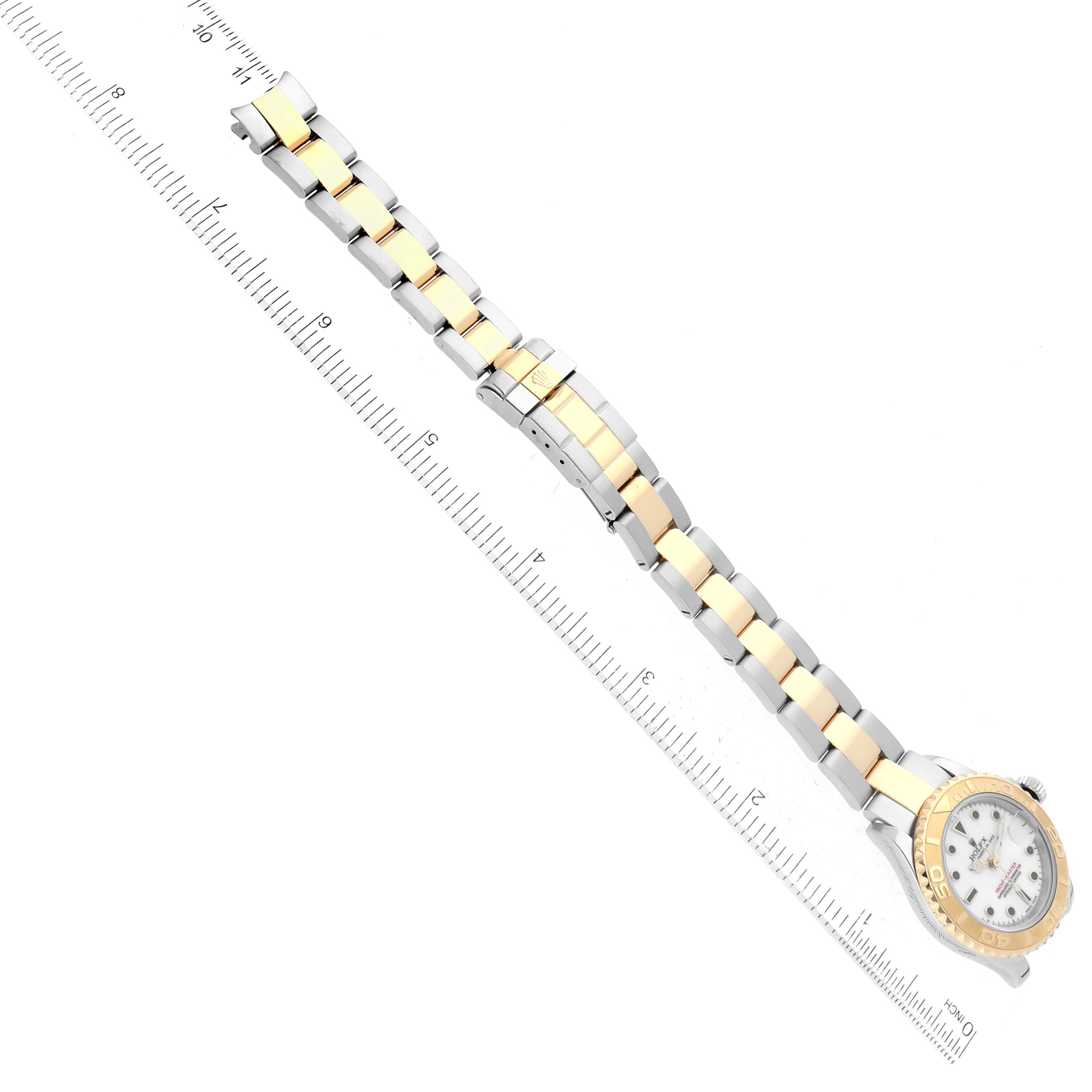 The image shows a top-down view of a Rolex Yacht-Master 169623 Women's Steel and Gold (two tone) White Dial 169623 Women's Steel and Gold (two tone) White Dial watch, highlighting its bracelet and part of the dial.