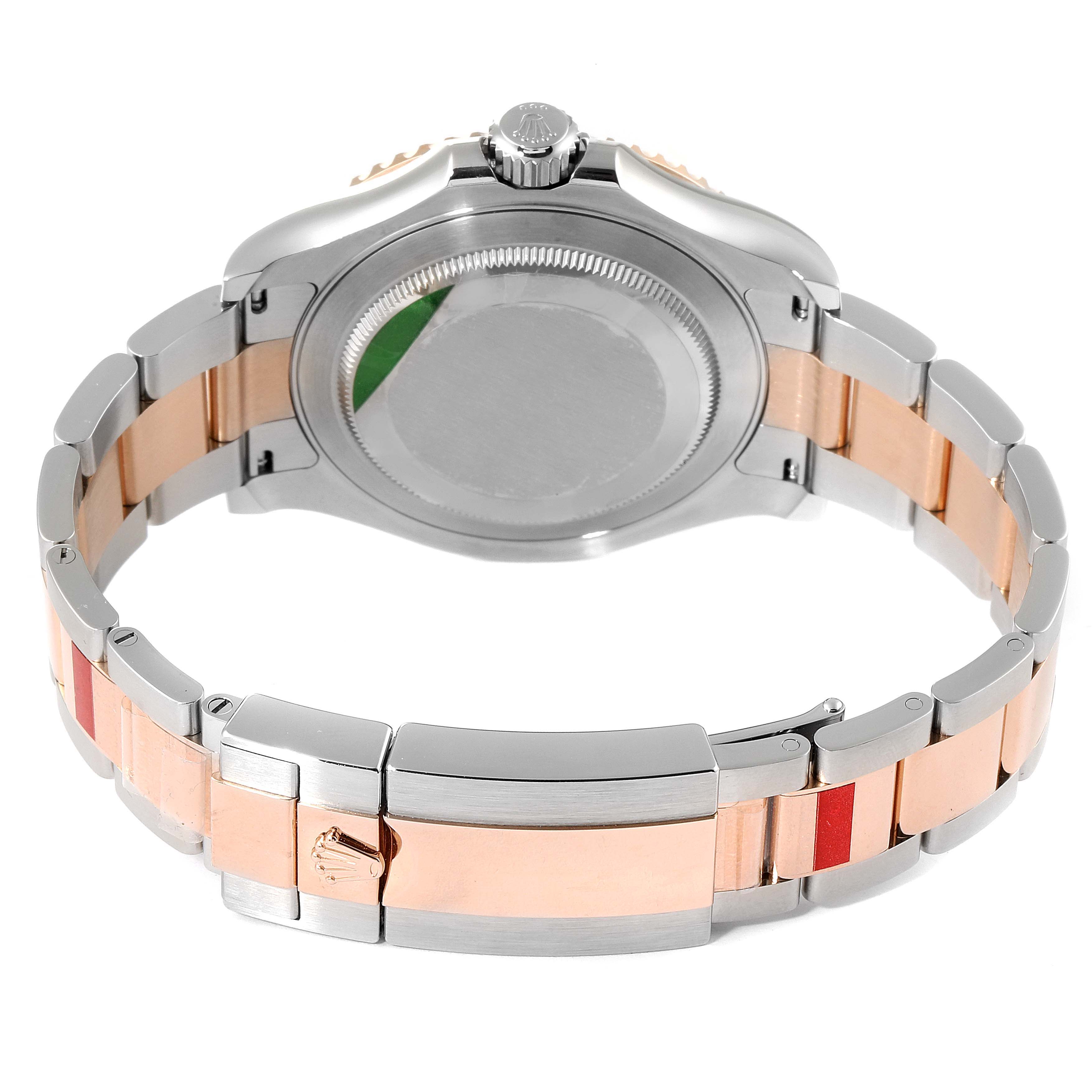 The image shows the back of the Rolex Yacht-Master 116621 Men's Steel and Gold (two tone) Brown Dial 116621 Men's Steel and Gold (two tone) Brown Dial watch, focusing on the case back and two-tone bracelet.