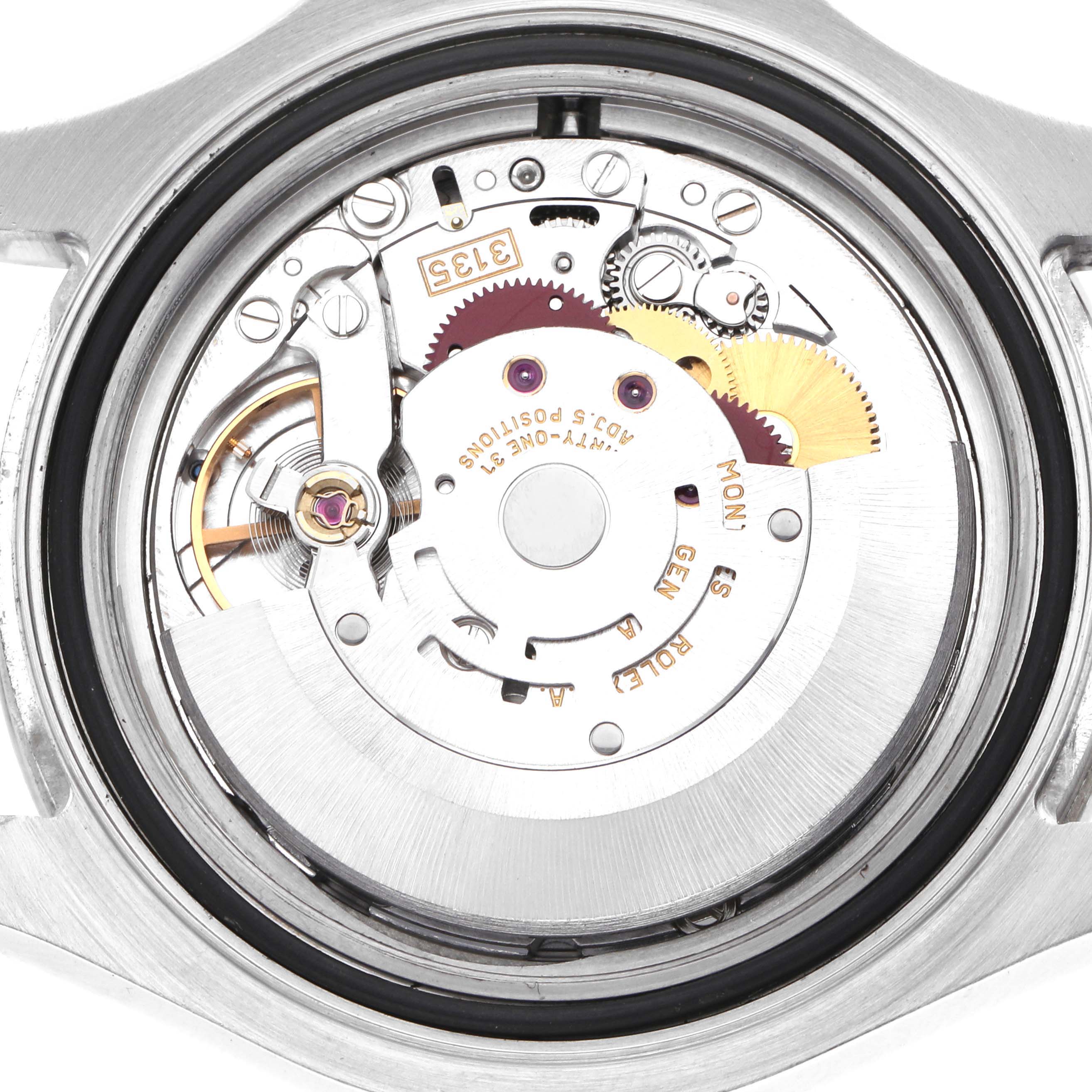 The image shows the movement of a Rolex Yacht-Master 16622 Men
s Stainless Steel Silver Dial watch from the back, including gears and the rotor.