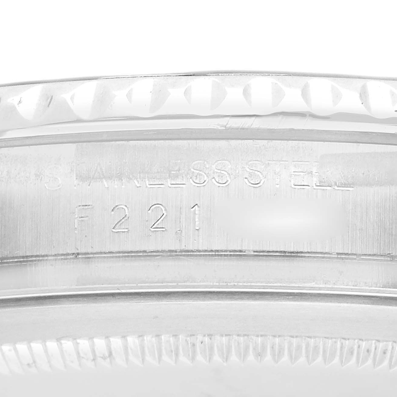 The image shows a close-up of the side of a Rolex Yacht-Master 16622 Men
s Stainless Steel Silver Dial watch, focusing on the bezel edge and engraved text.