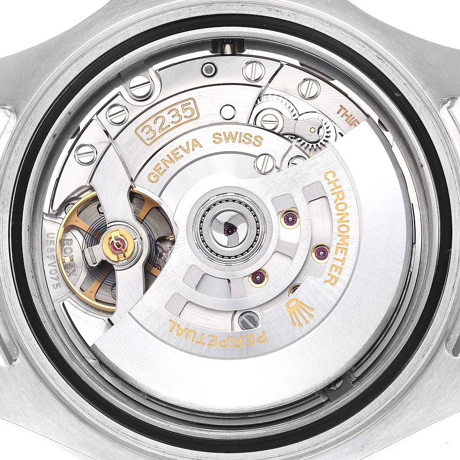 The image shows the movement of a Rolex Yacht-Master 126622 Men's Stainless Steel Grey Dial watch from the back, highlighting its internal mechanism and rotor.