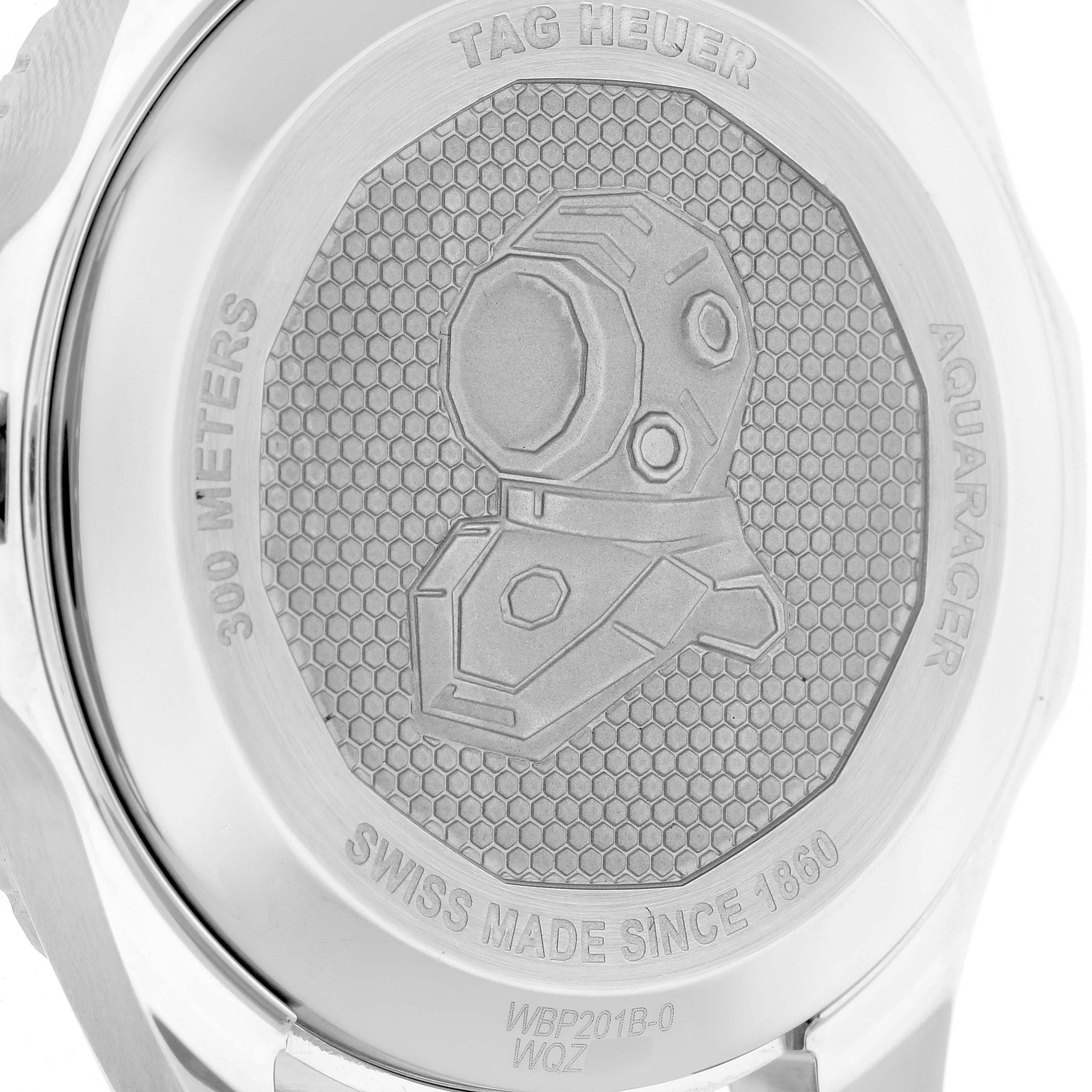 The image shows the back case of a Tag Heuer Aquaracer WBP201B.BA0632 Men's Stainless Steel Blue Dial WBP201B.BA0632 Men's Stainless Steel Blue Dial watch with engravings and a diver's helmet design.