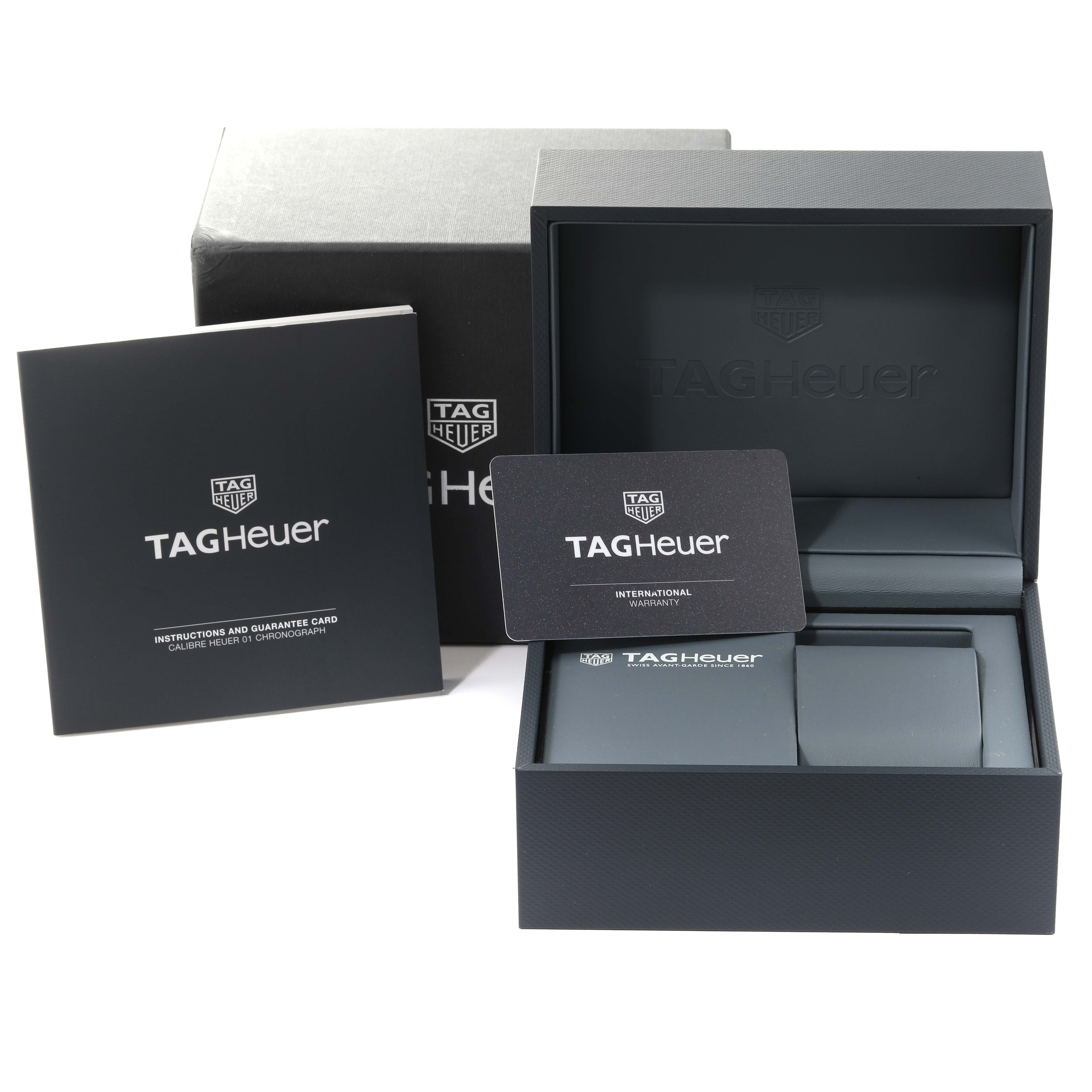 The image shows the Tag Heuer Carrera CAR2A90.FT6071 Men's Ceramic Black Dial CAR2A90.FT6071 Men's Ceramic Black Dial watch packaging, including the box, manual, and warranty card.
