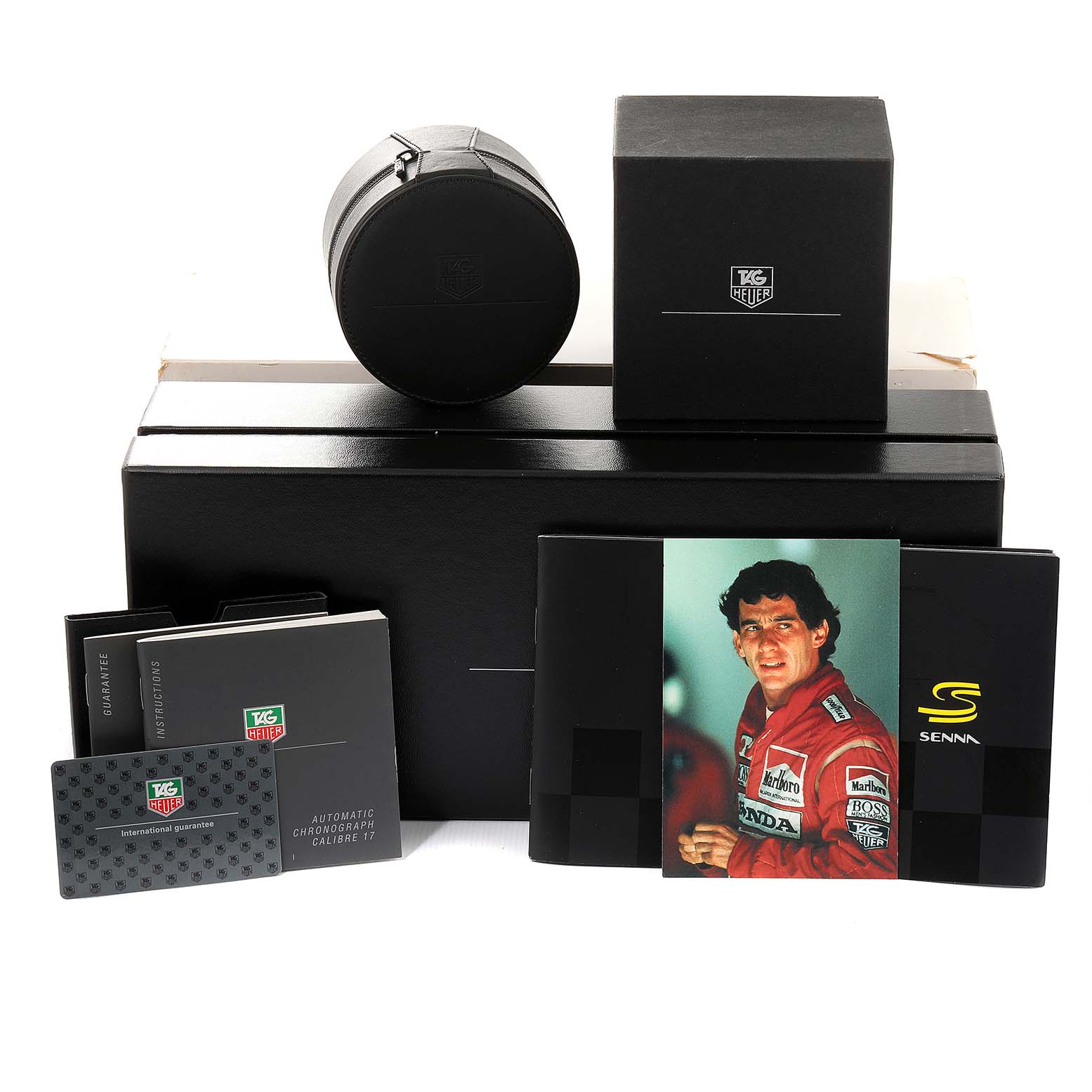 This image shows the box, accessories, and documentation for the Tag Heuer Link CT2115 Men
s Stainless Steel Black Dial CT2115 Men
s Stainless Steel Black Dial watch model.