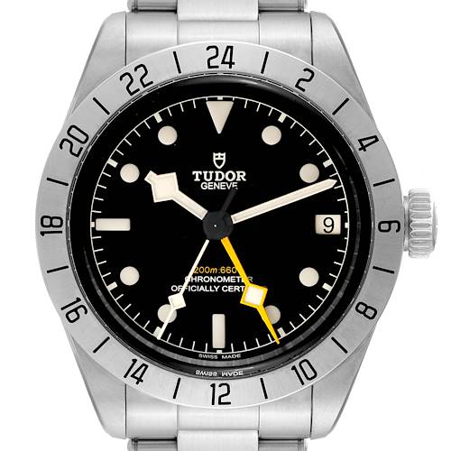 The image shows a frontal view of a Tudor Heritage Black Bay watch, highlighting its dial, bezel, and part of the bracelet.