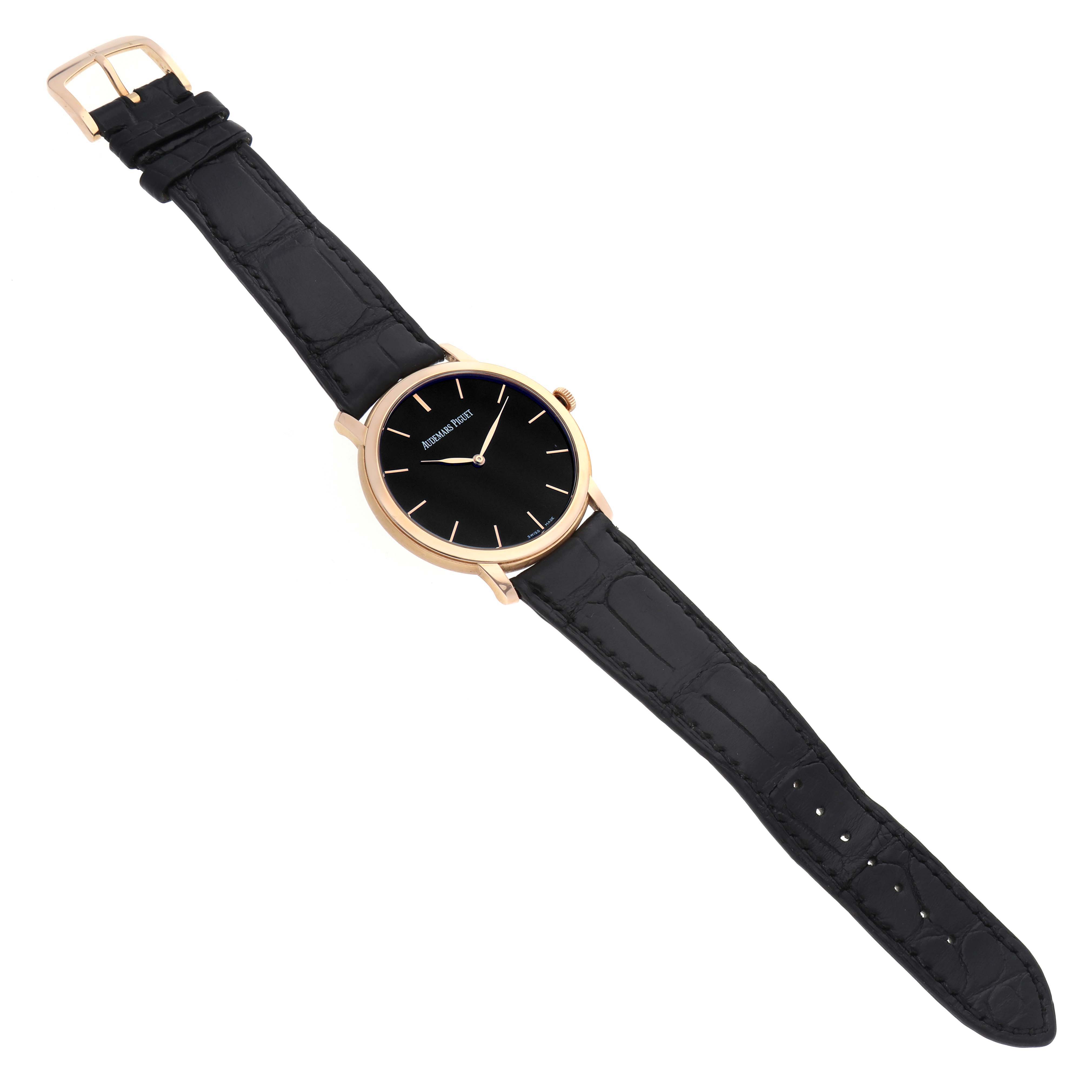 The Audemars Piguet Jules 15180R Men's Rose Gold Black Dial watch is shown from a top-down angle, displaying the black leather strap and round face with a black dial.