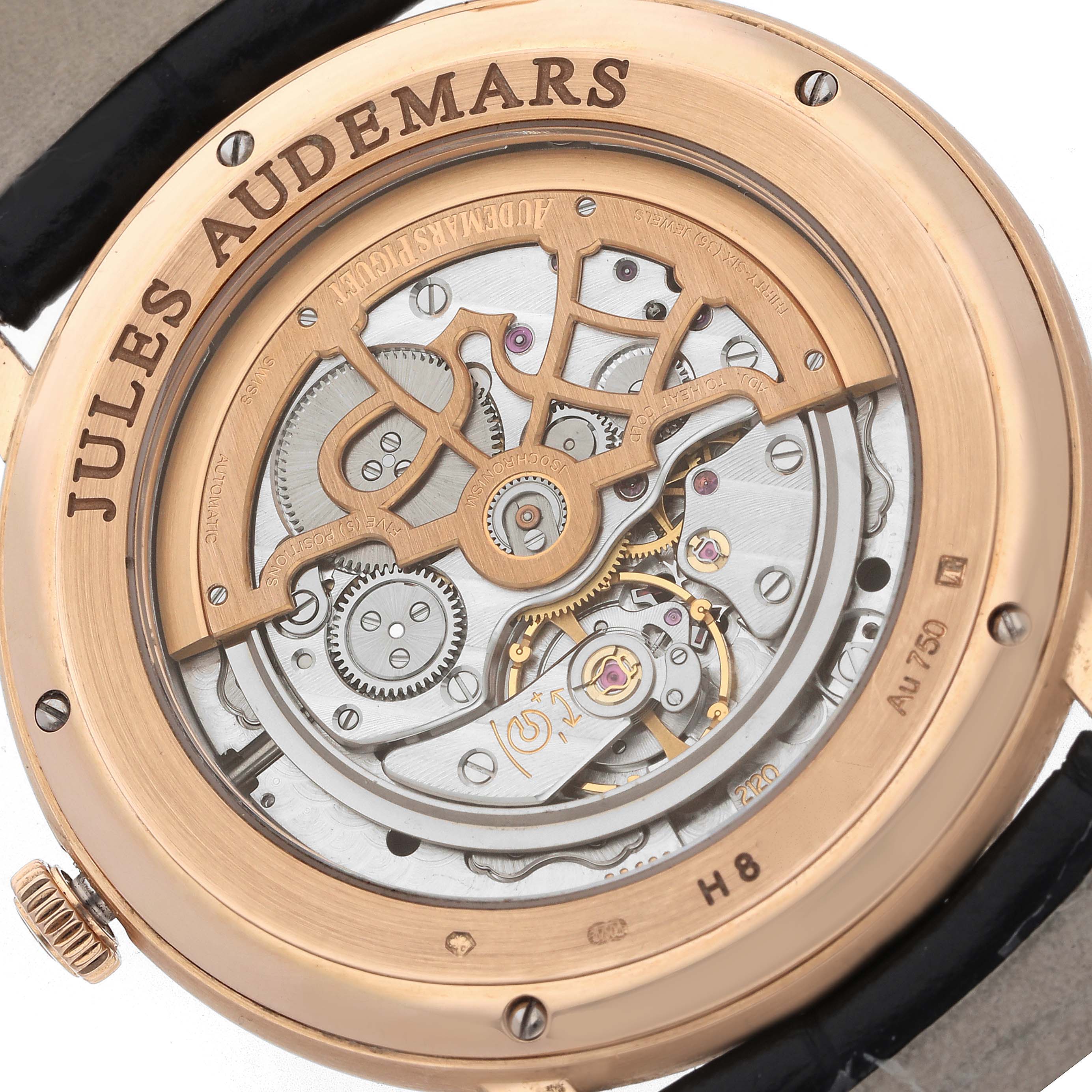 The image shows the back of a Jules model watch by Audemars Piguet, highlighting the movement and intricate mechanics.
