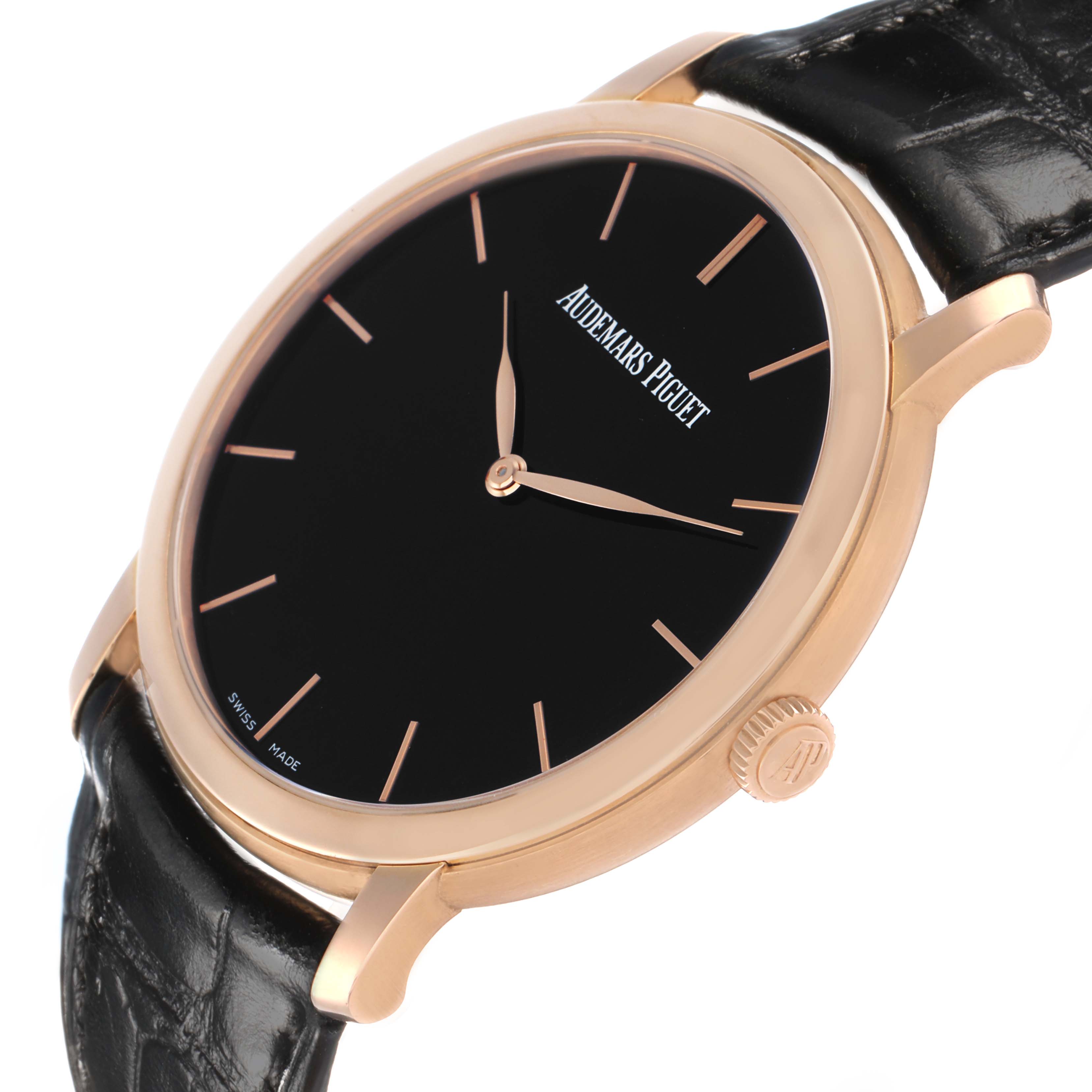 The Jules model by Audemars Piguet is shown at a three-quarter angle displaying the face, bezel, crown, and black leather strap.