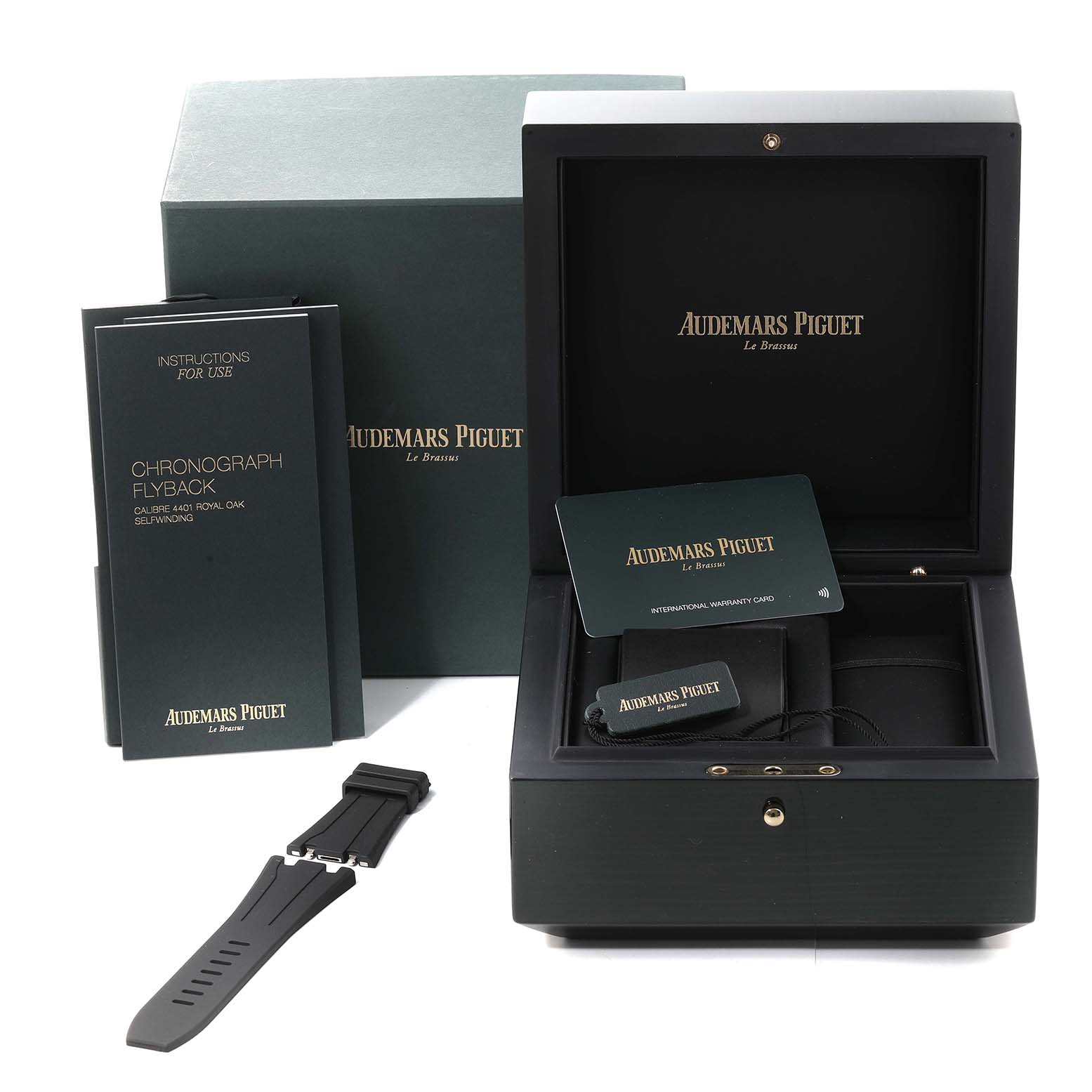 The image shows the box, warranty card, instruction manual, extra strap, and packaging for an Audemars Piguet Royal Oak Offshore 26420TI.OO.A027CA.01 Men's Titanium Blue Dial 26420TI.OO.A027CA.01 Men's Titanium Blue Dial watch.