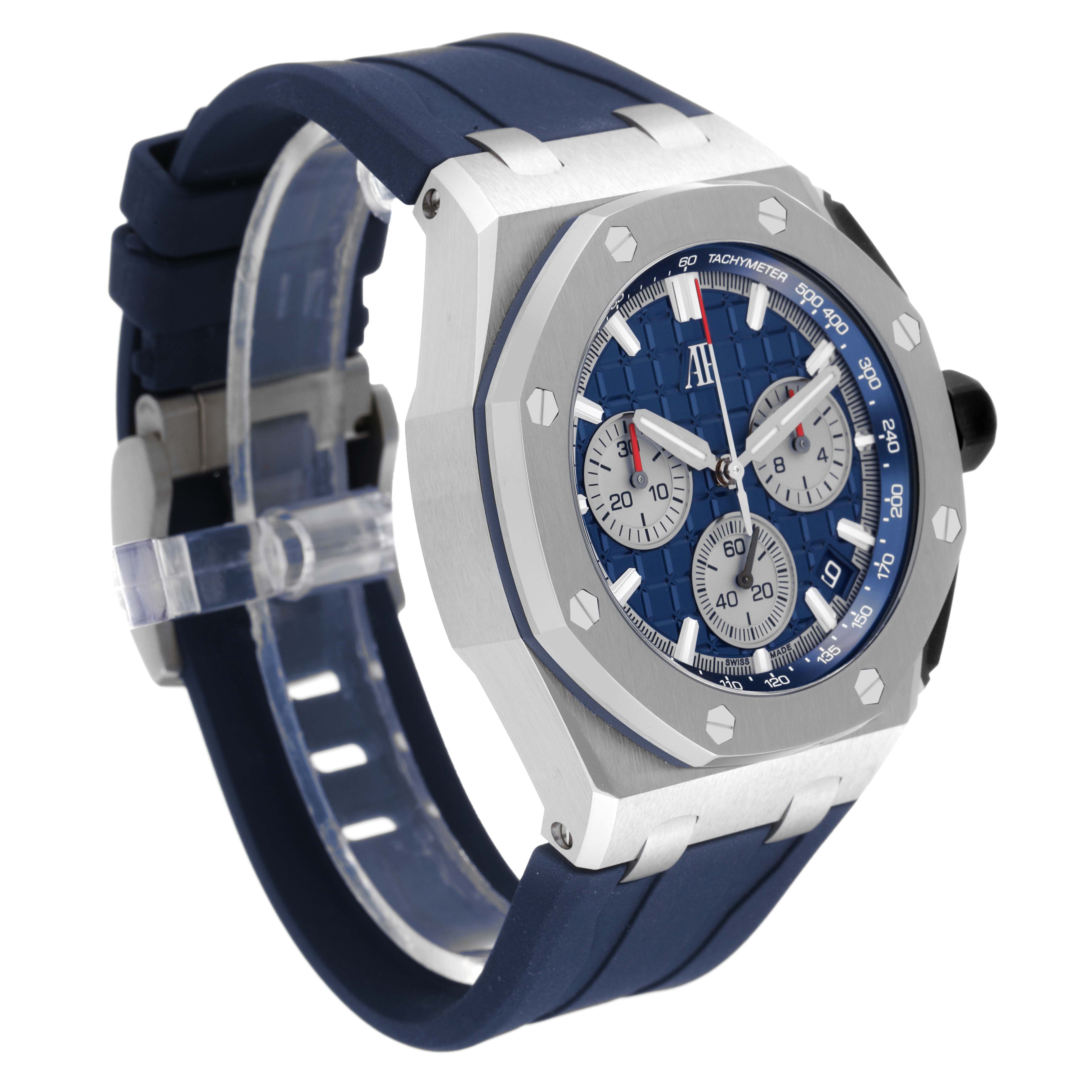 The image shows a side-angle view of the Audemars Piguet Royal Oak Offshore 26420TI.OO.A027CA.01 Men's Titanium Blue Dial 26420TI.OO.A027CA.01 Men's Titanium Blue Dial watch, highlighting its dial, bezel, and strap.