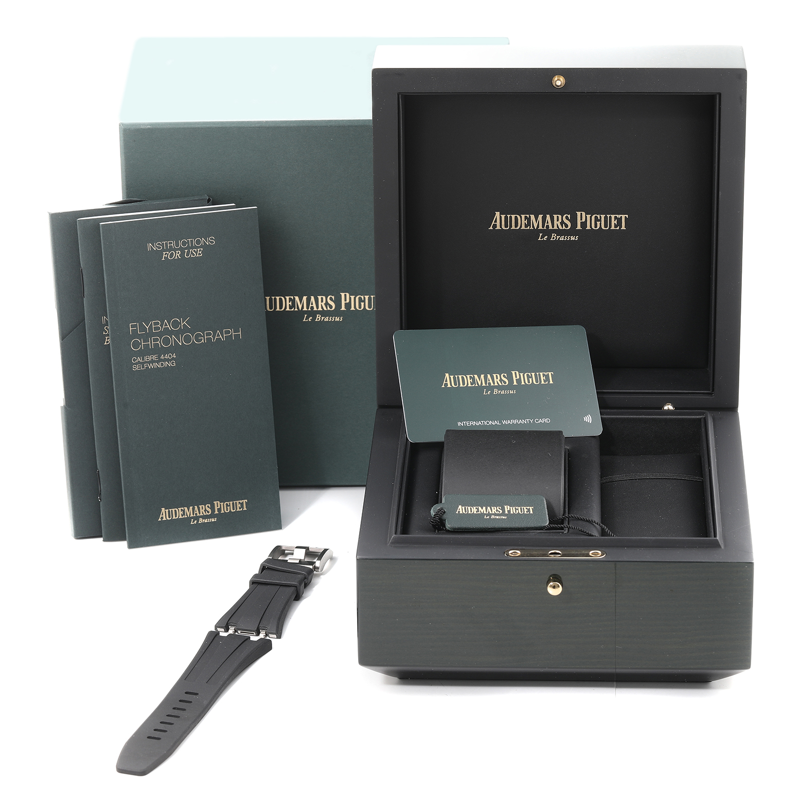 The image shows an Audemars Piguet Royal Oak Offshore 26238TI.OO.2000TI.01 Men's Titanium Grey Dial 26238TI.OO.2000TI.01 Men's Titanium Grey Dial watch box, warranty card, instruction manuals, and an additional strap.