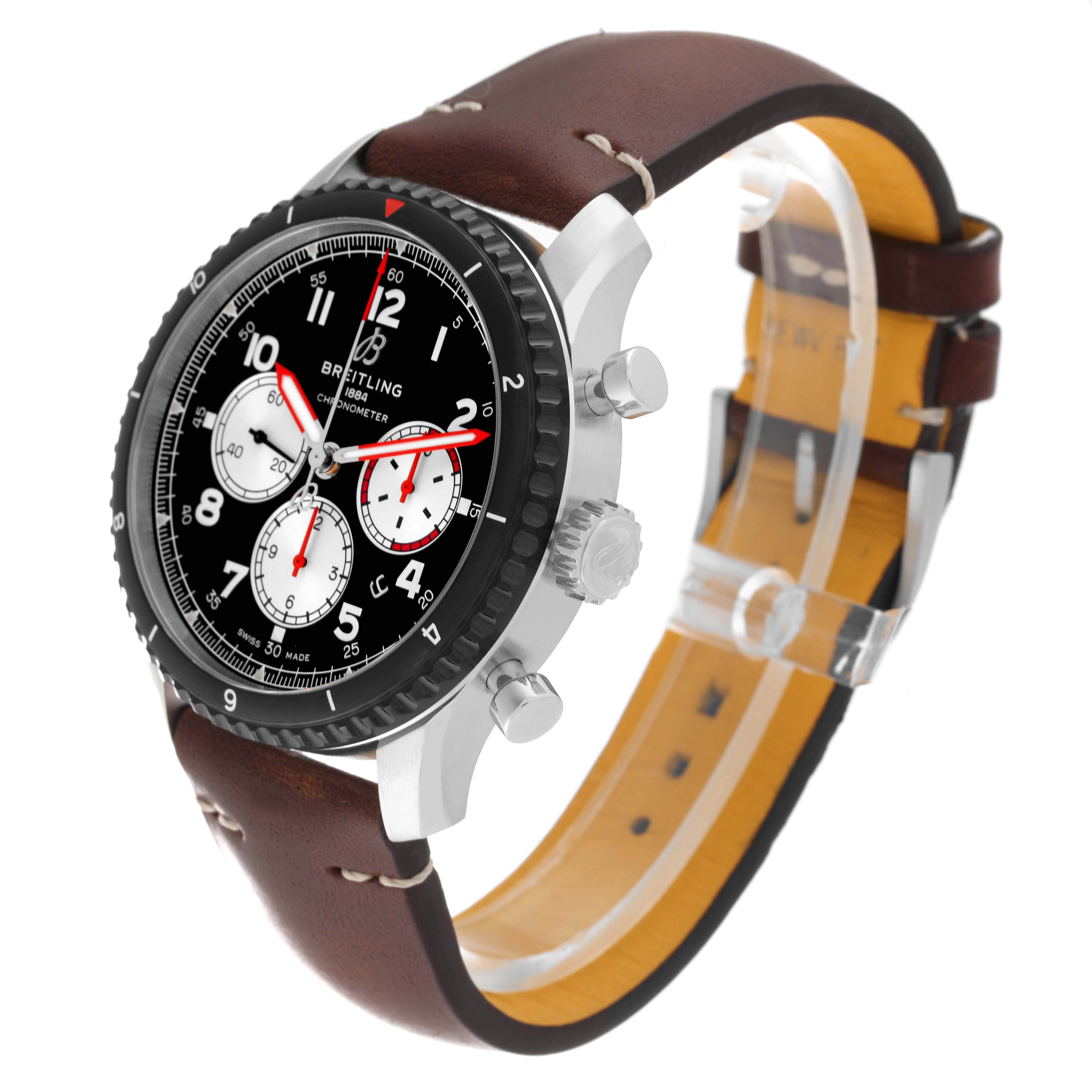 The Aviator model by Breitling is shown at a three-quarter angle, displaying the dial, bezel, crown, pushers, and leather strap.