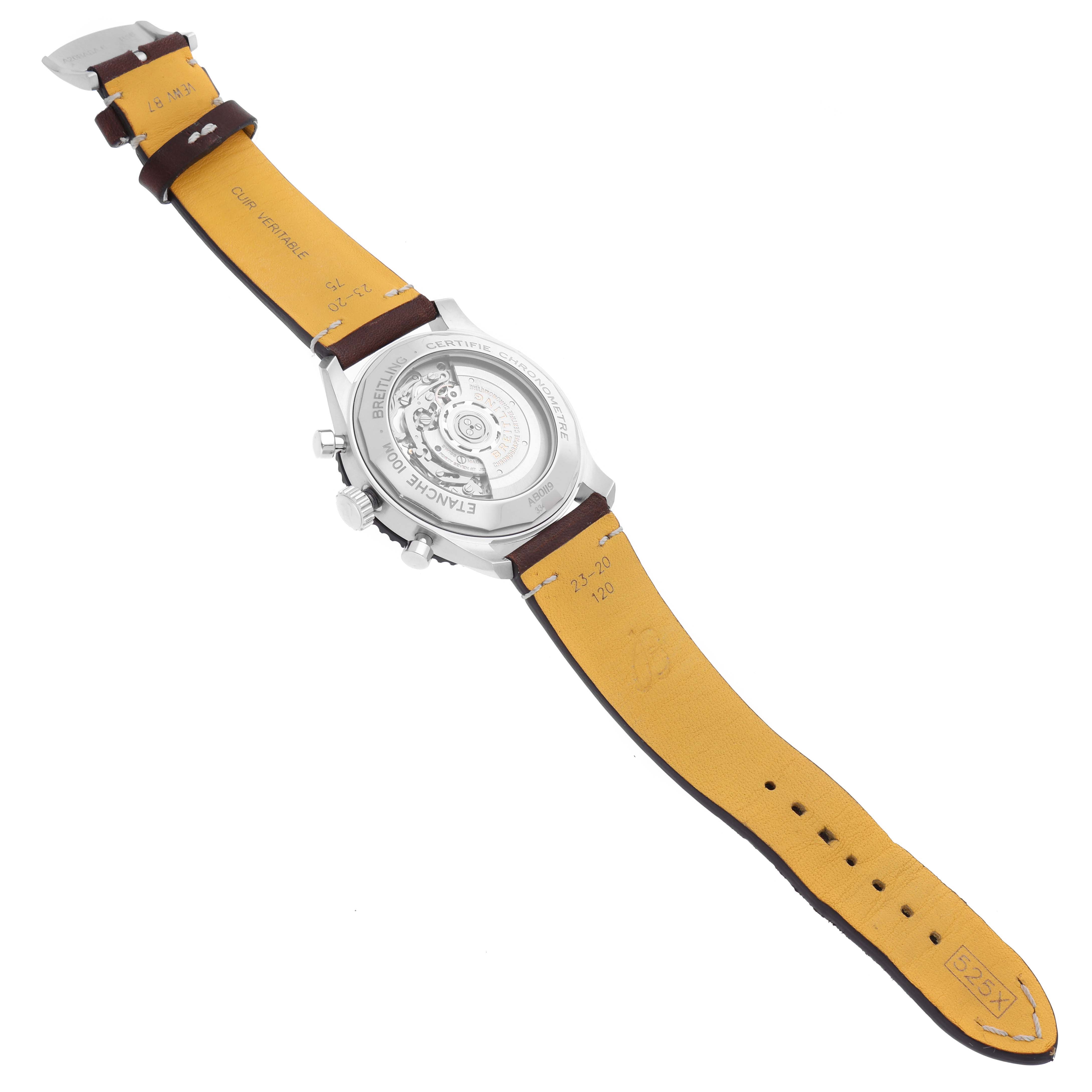 The Breitling Aviator AB0119 Men's Stainless Steel Black Dial AB0119 Men's Stainless Steel Black Dial watch is shown from the back, highlighting the open case back and leather strap.