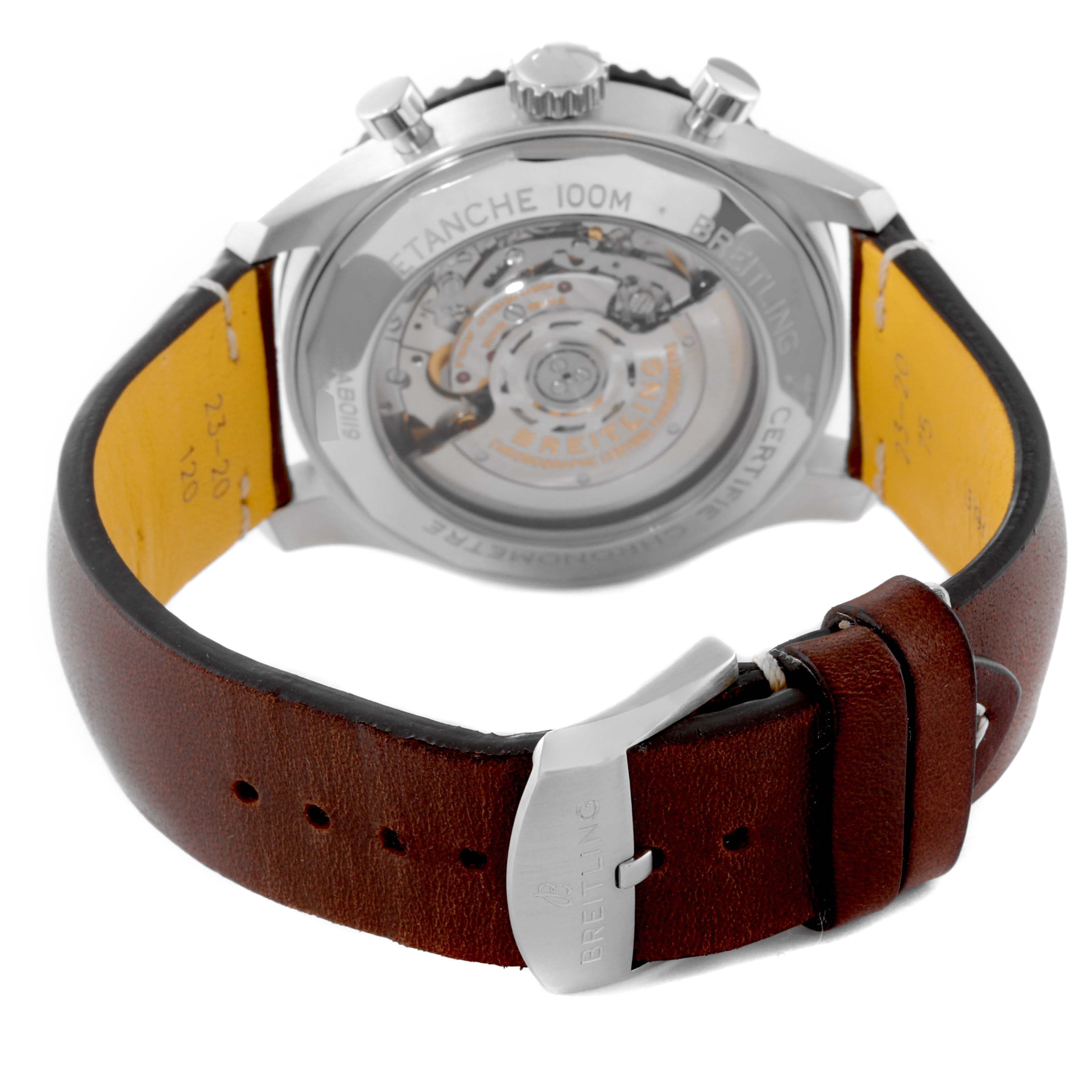 The image shows the back view of a Breitling Aviator AB0119 Men's Stainless Steel Black Dial AB0119 Men's Stainless Steel Black Dial watch, highlighting its open case back and brown leather strap.