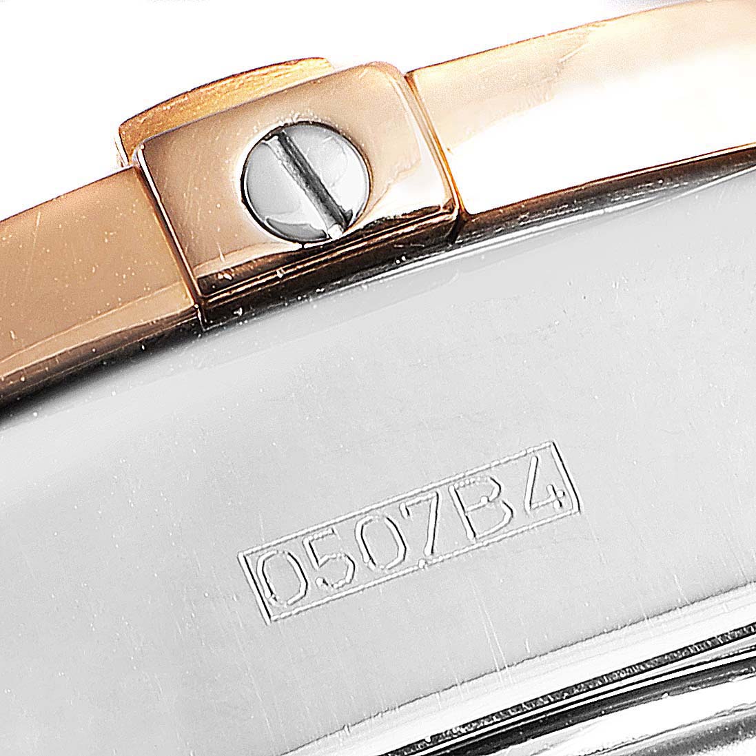 The image shows a close-up view of the clasp and part of the metal bracelet of a Breitling Chronomat C13356 Men's Steel and Gold (two tone) Silver Dial C13356 Men's Steel and Gold (two tone) Silver Dial watch.