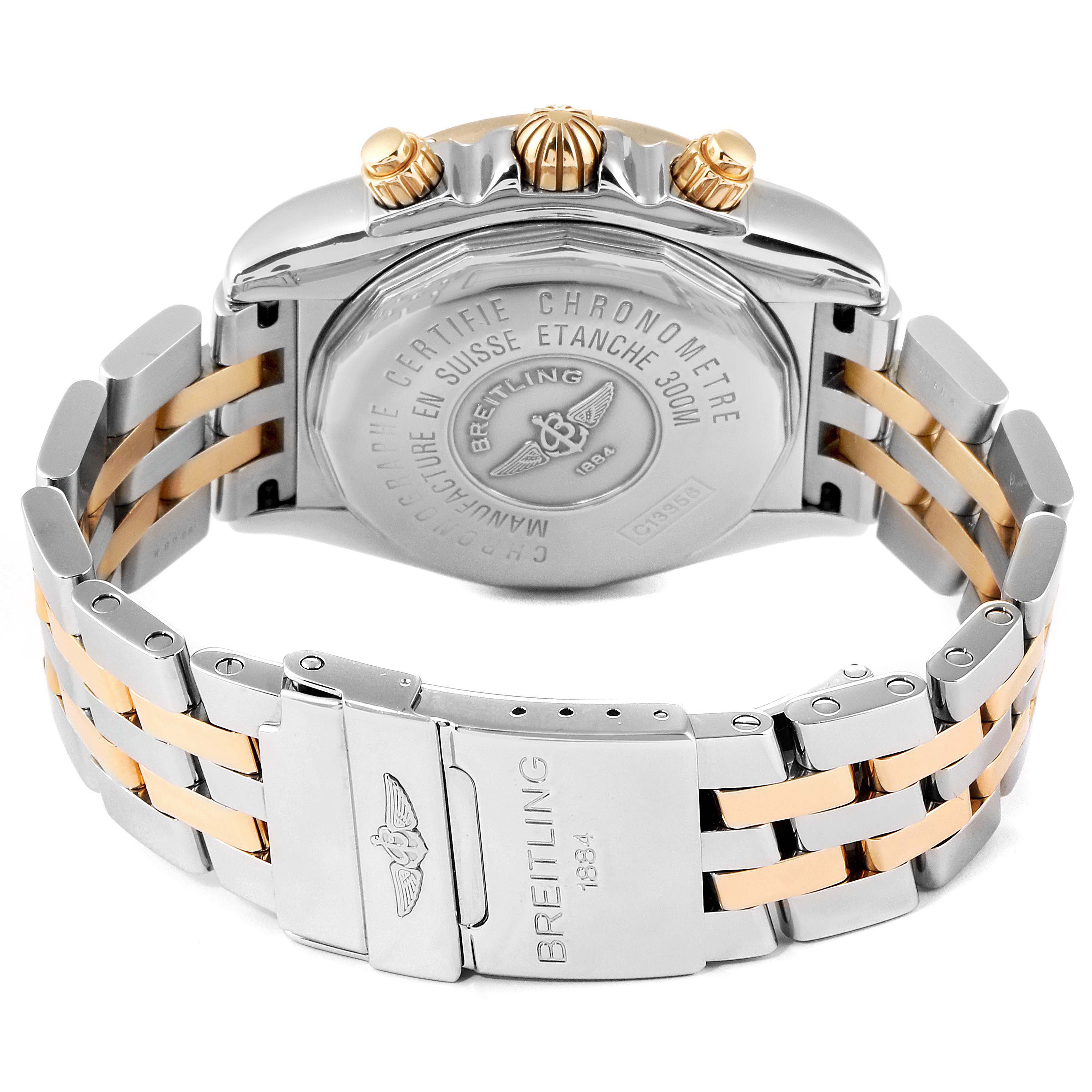 The image shows the back and clasp of a Breitling Chronomat C13356 Men's Steel and Gold (two tone) Silver Dial C13356 Men's Steel and Gold (two tone) Silver Dial watch, highlighting its bracelet and case back details.