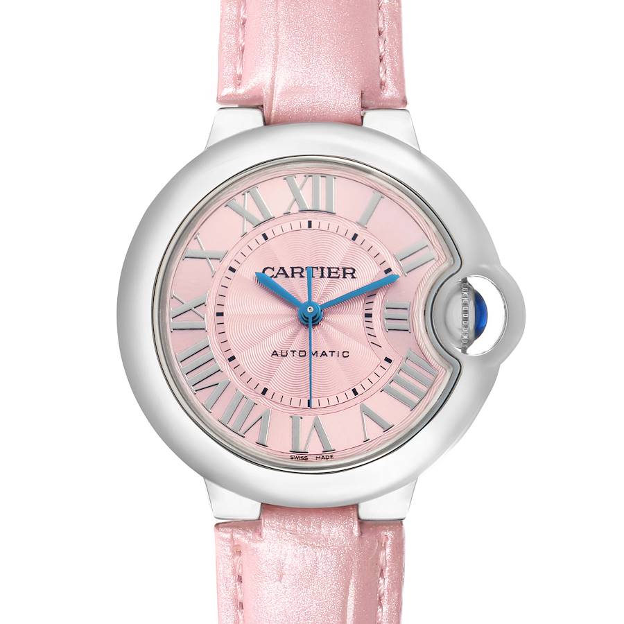 The Cartier Ballon Bleu WSBB0002 Women's Stainless Steel Pink Dial watch is shown from a front angle, highlighting the pink dial, blue hands, Roman numerals, and pink strap.
