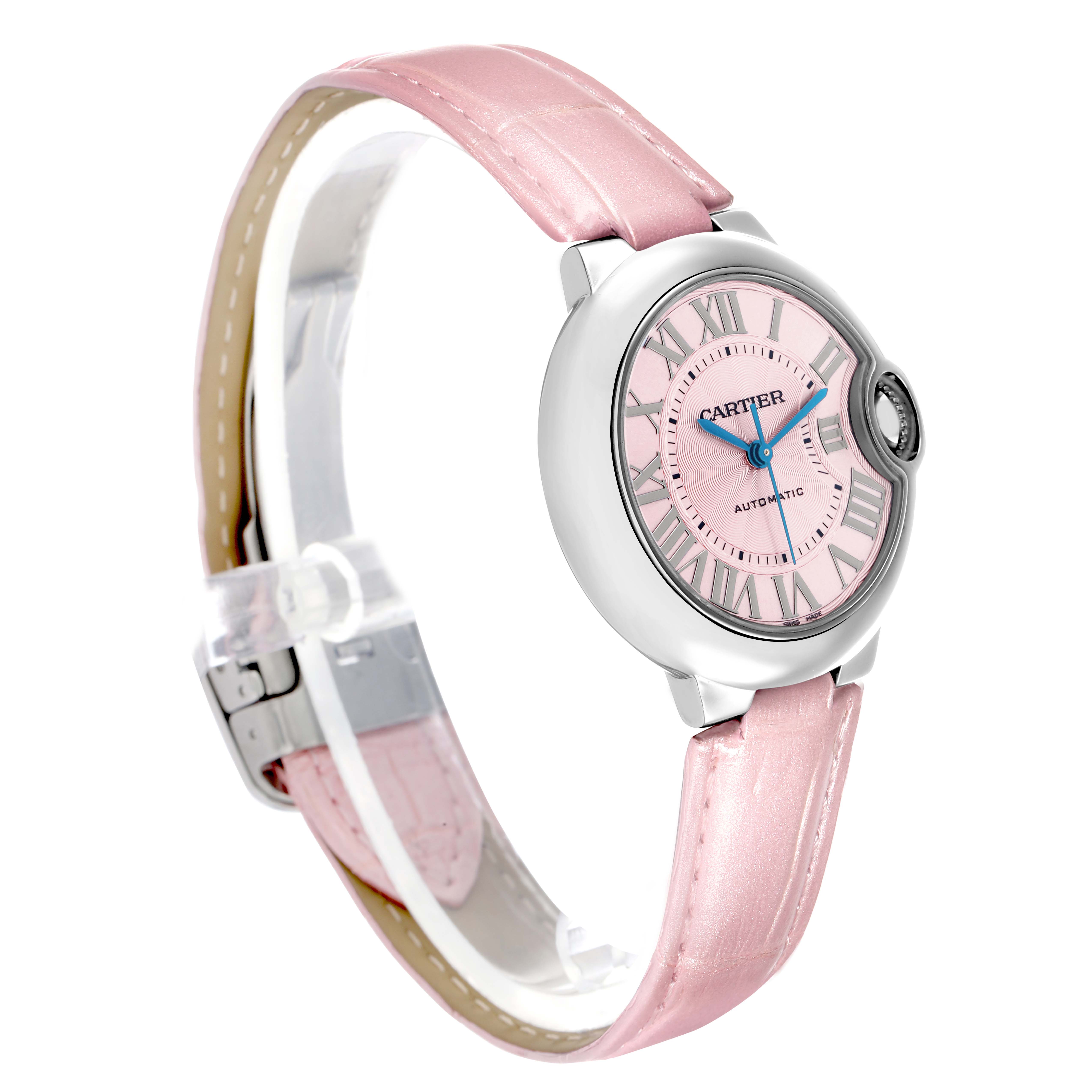 The Cartier Ballon Bleu WSBB0002 Women
s Stainless Steel Pink Dial watch is shown at a three-quarter angle, highlighting its pink dial, silver case, and pink leather strap.