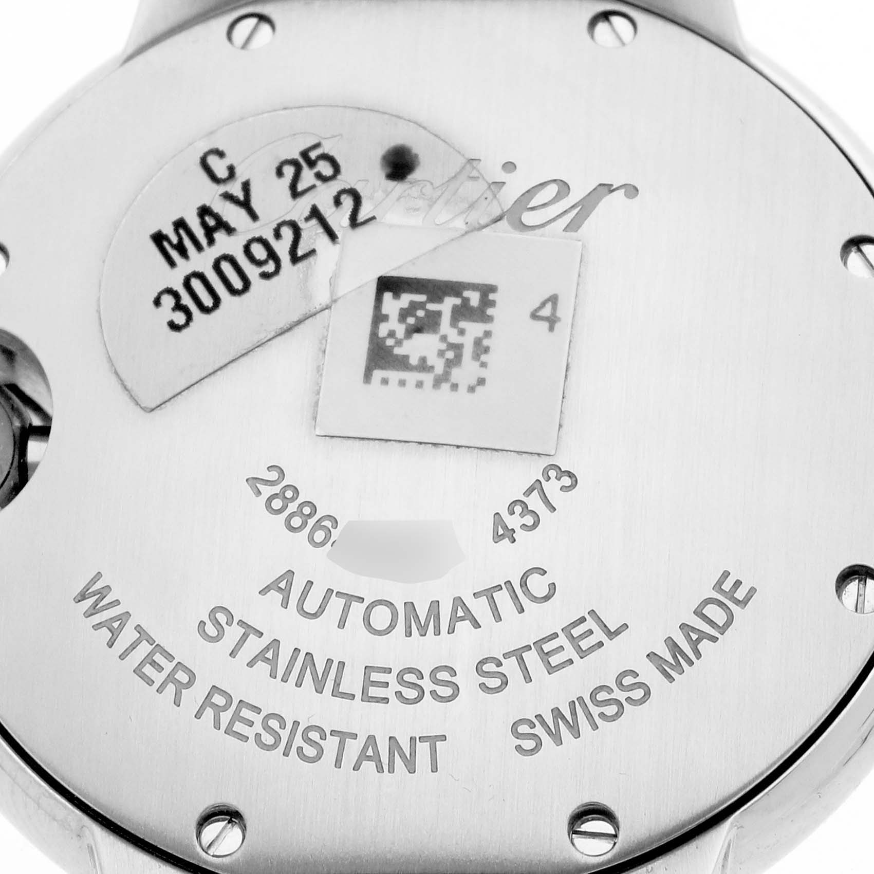 The image shows the back of a Cartier Ballon Bleu W4BB0028 Women
s Stainless Steel Blue Dial watch, highlighting the engraving details and material information.