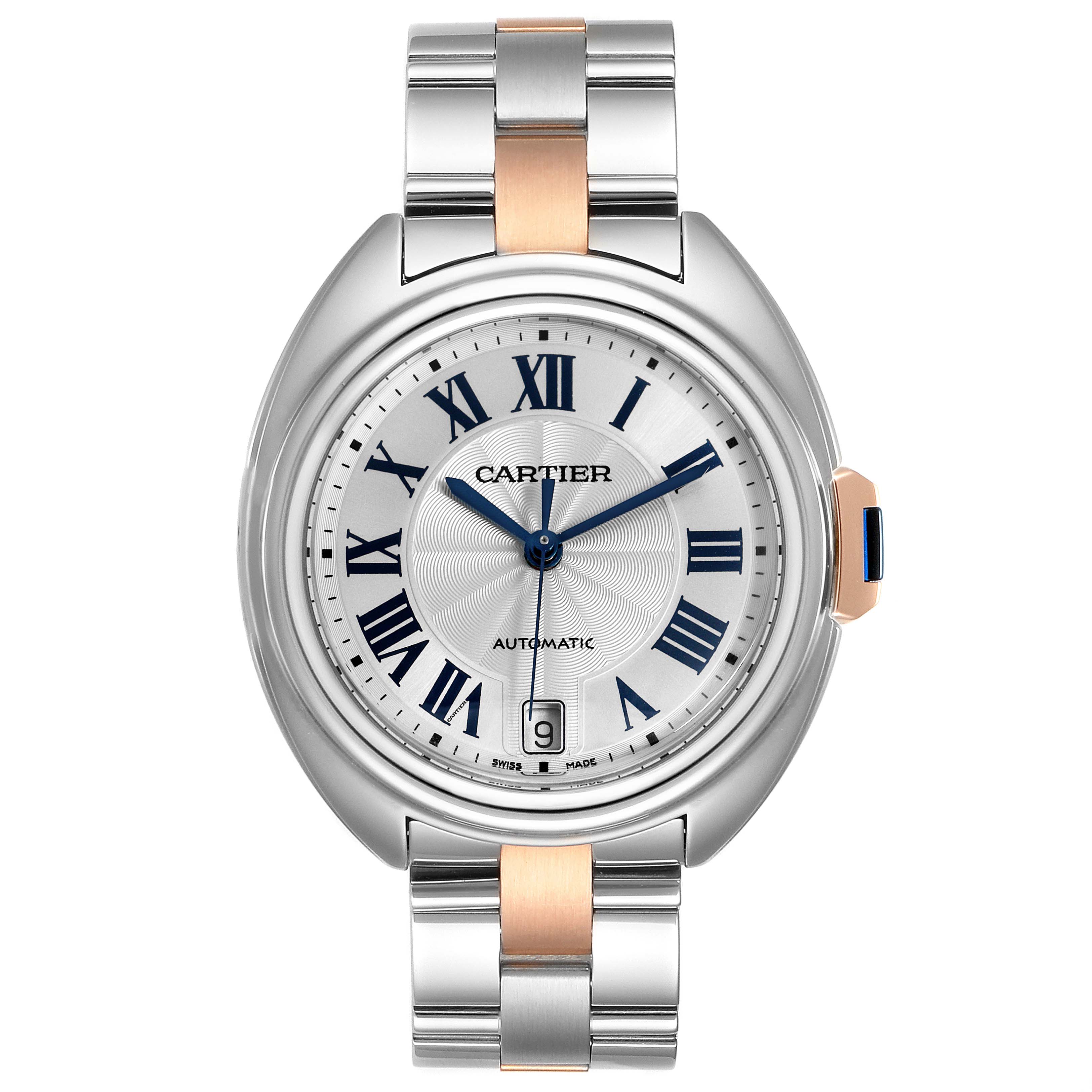The image shows a front view of a Cle de Cartier automatic watch, highlighting the face, case, and bracelet.
