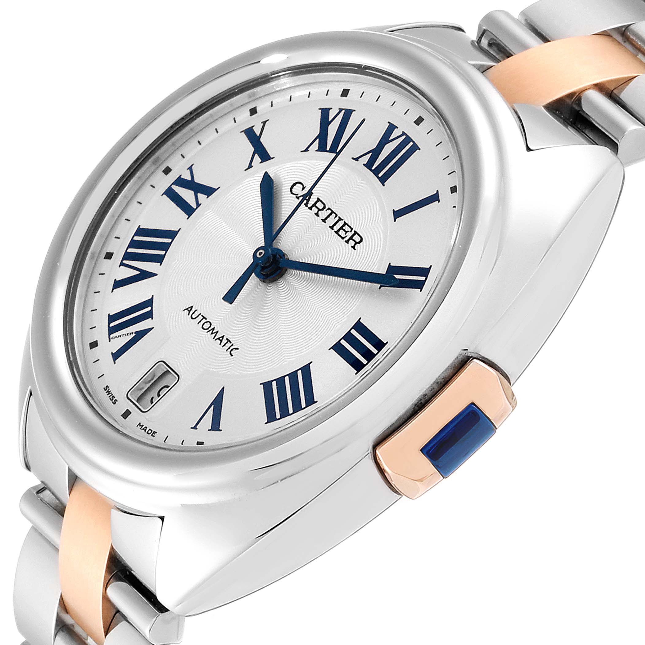 The image shows a side angle of the Cartier Clé watch, highlighting the dial, crown, and part of the bracelet.