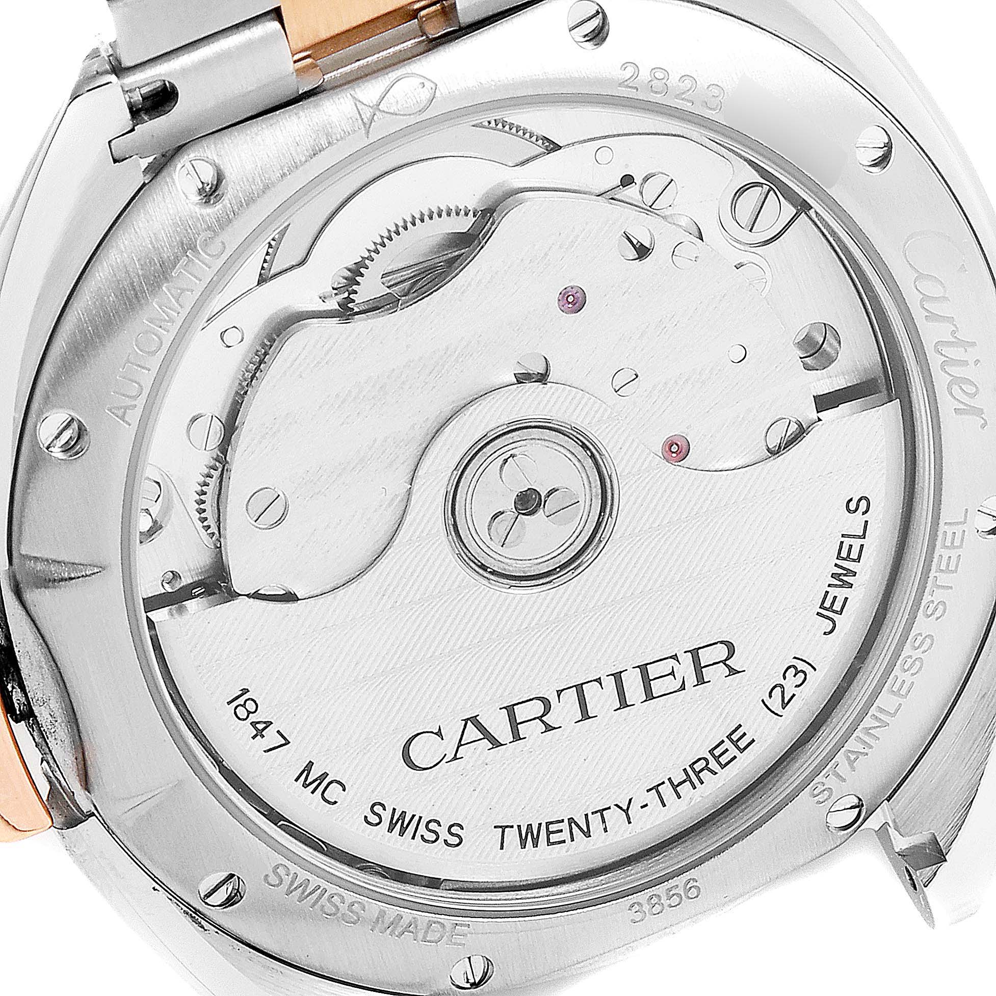 The image shows the back of a Cartier Cle WSCL0003 Women's Steel and Gold (two tone) Blue Dial WSCL0003 Women's Steel and Gold (two tone) Blue Dial model watch, displaying the automatic movement and jewel details.