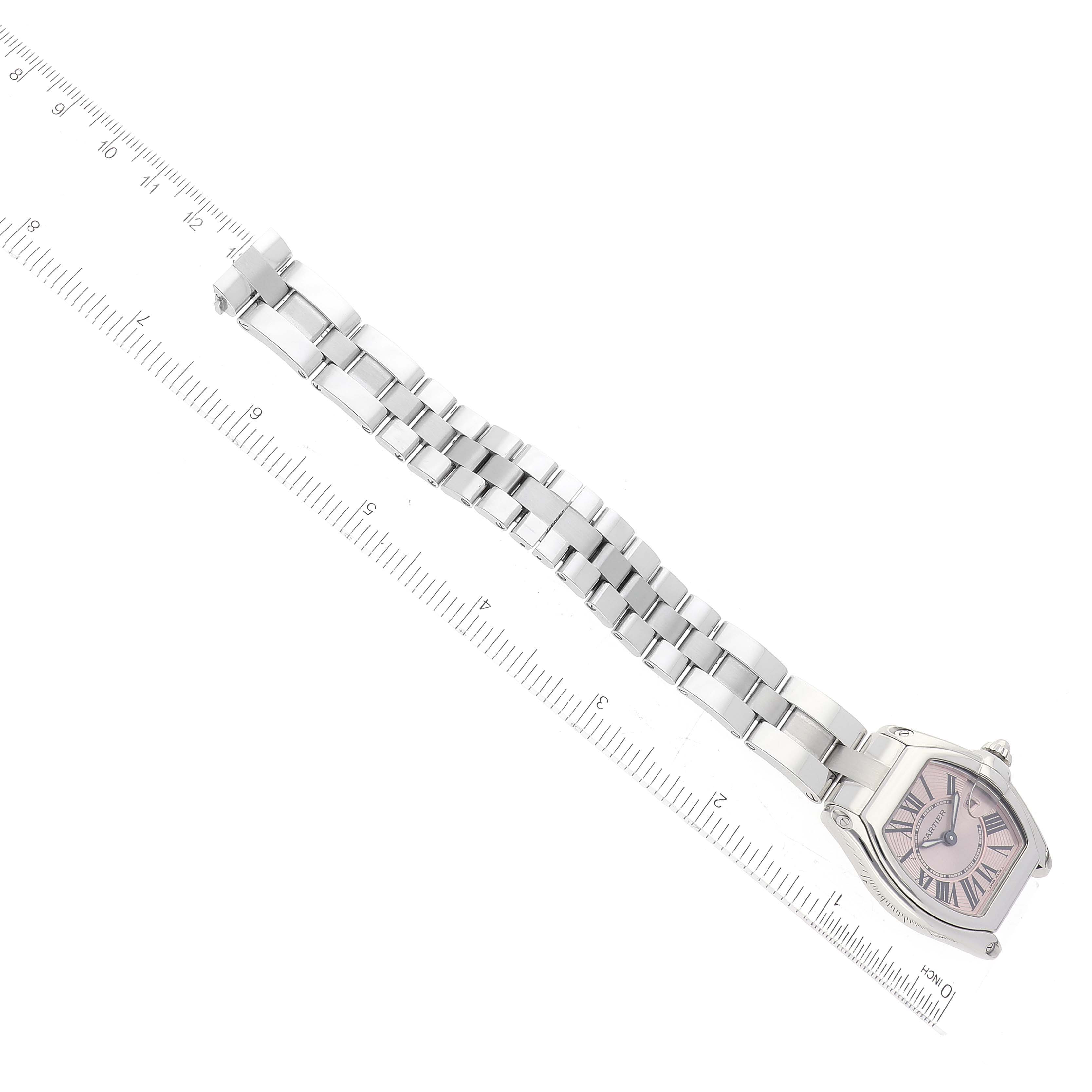 The Cartier Roadster W62017V3 Women's Stainless Steel Pink Dial W62017V3 Women's Stainless Steel Pink Dial watch is shown from a top-down angle, with its face and full metal bracelet visible.
