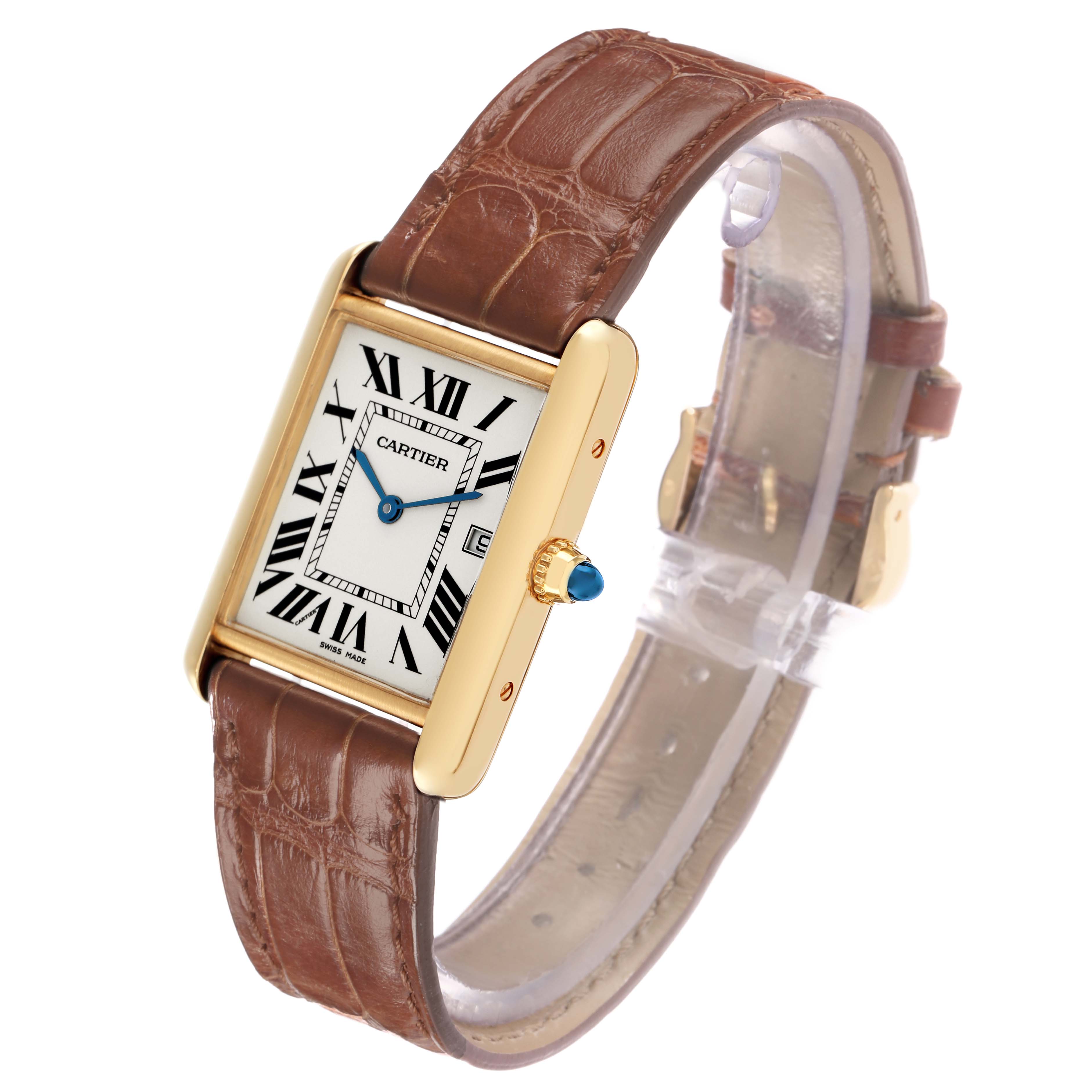 The Cartier Tank Louis W1529756 Men's Yellow Gold Silver Dial watch is shown at an angle highlighting the face, gold case, brown leather strap, and a blue cabochon crown.