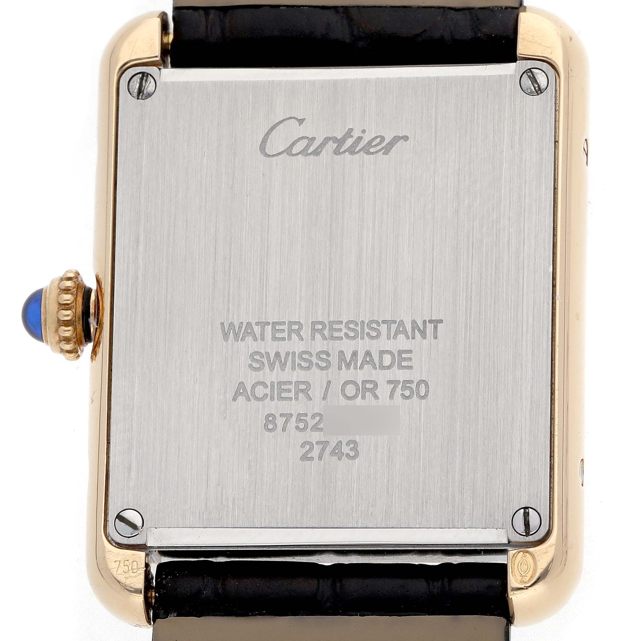 The image shows the back of the Cartier Tank Solo W1018755 Women
s Yellow Gold Silver Dial watch, highlighting its caseback, crown, and strap attachment.